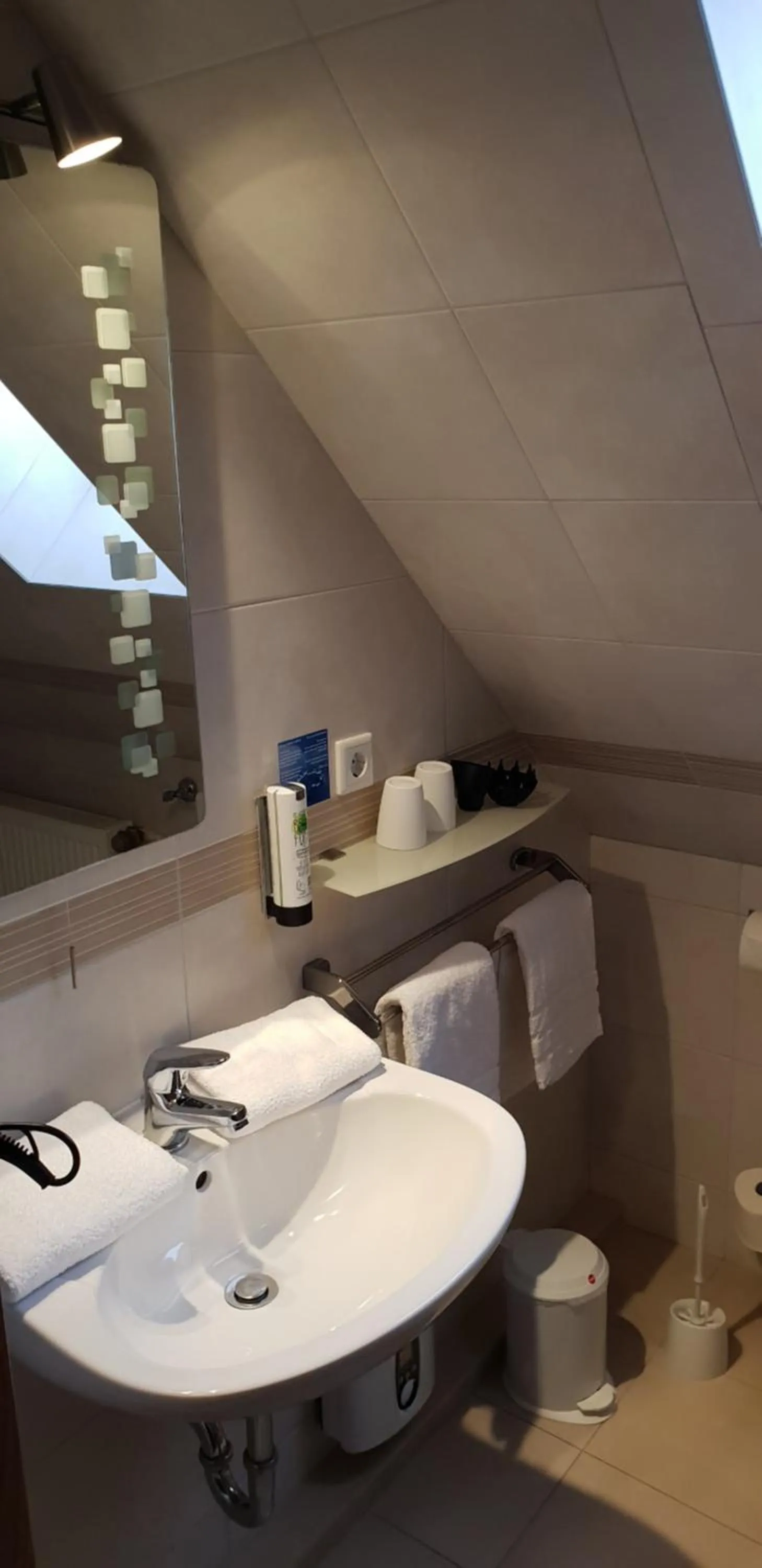 Bathroom in Airport Hotel One Aparthotel Sylt