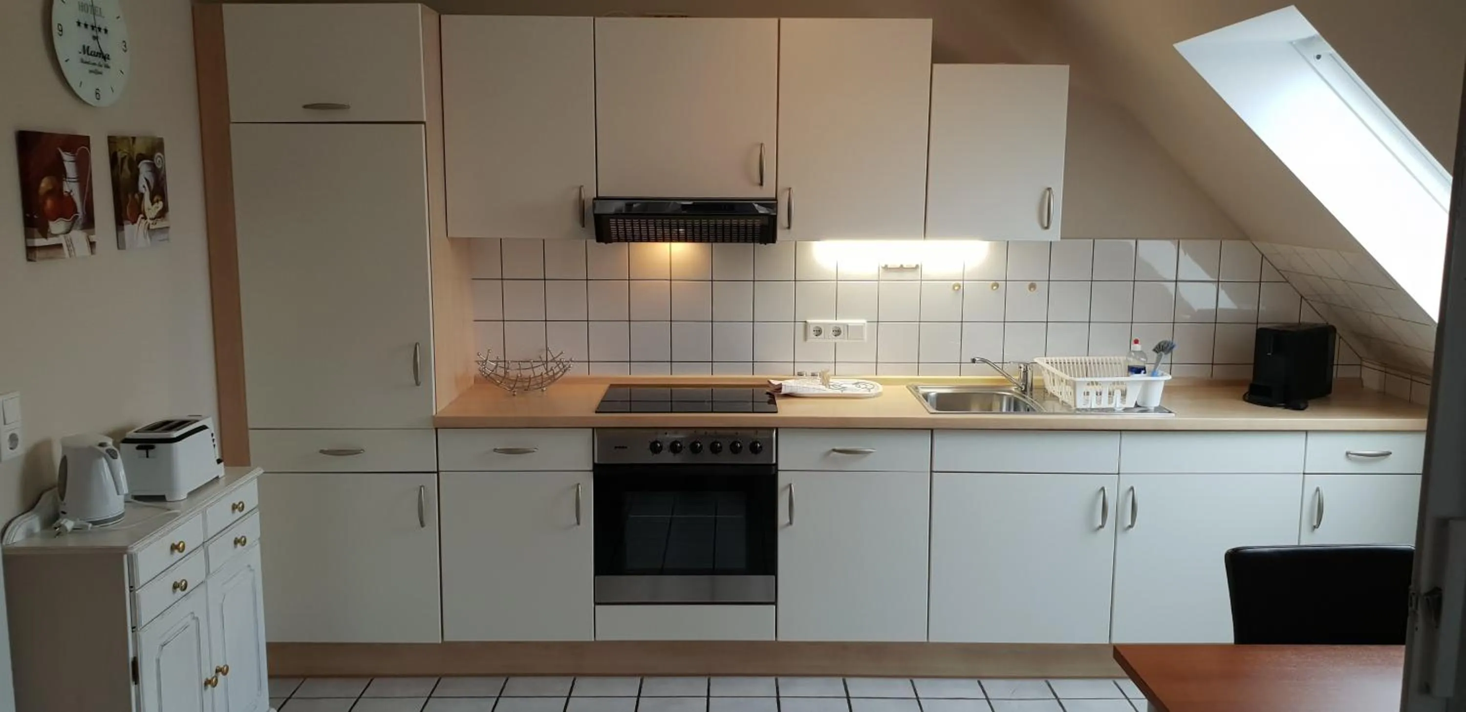 Kitchen or kitchenette in Airport Hotel One Aparthotel Sylt