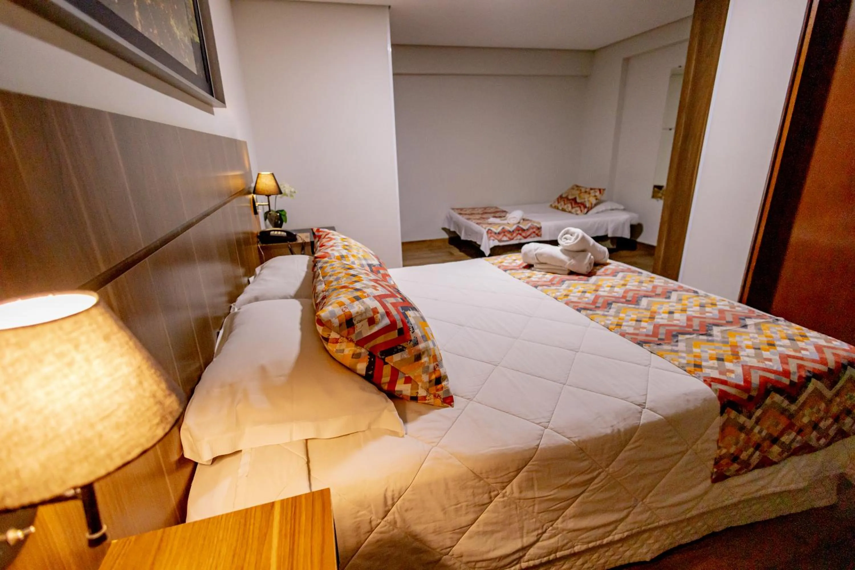 Bed in Padom Business Hotel