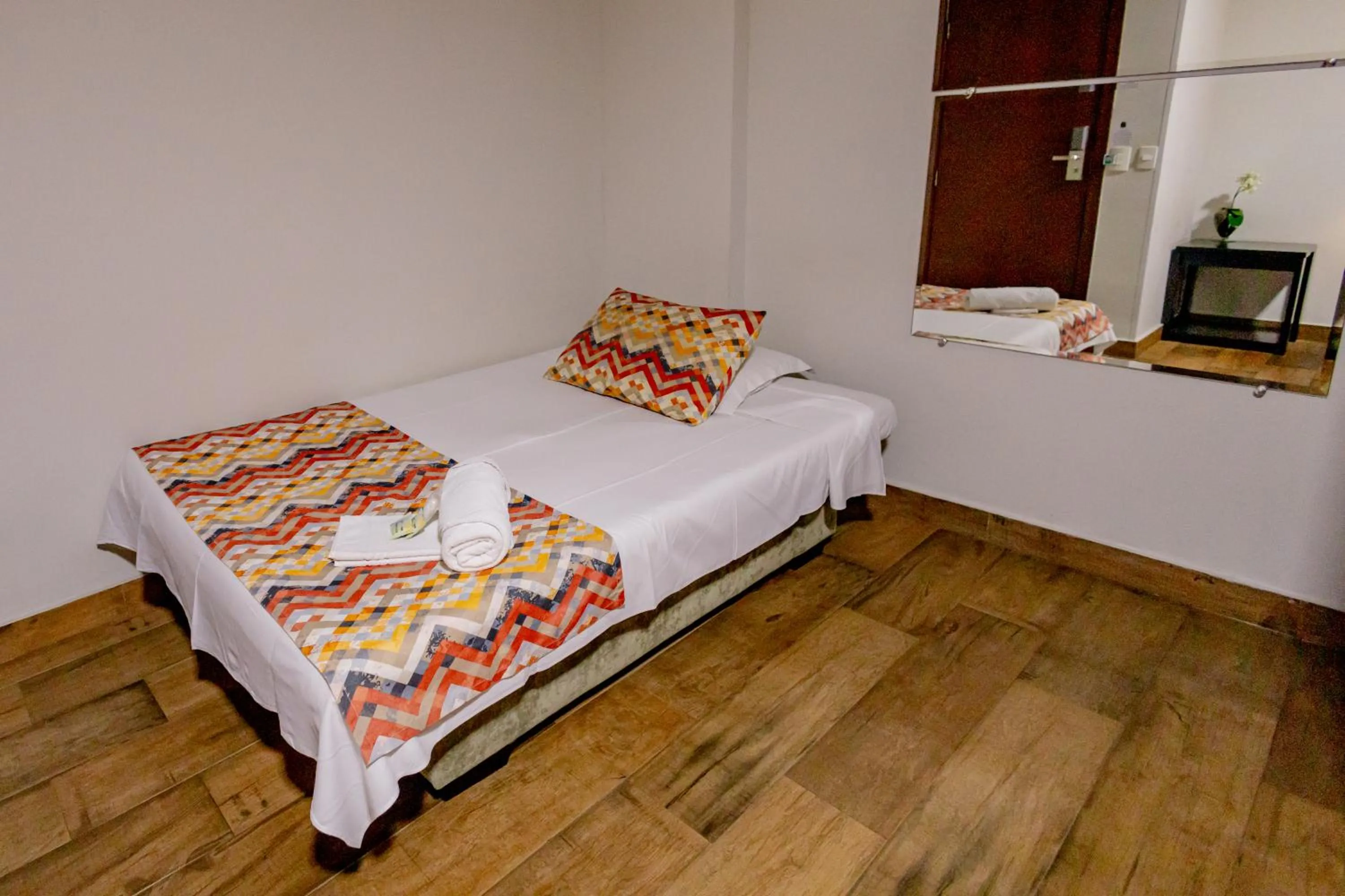 Bed in Padom Business Hotel