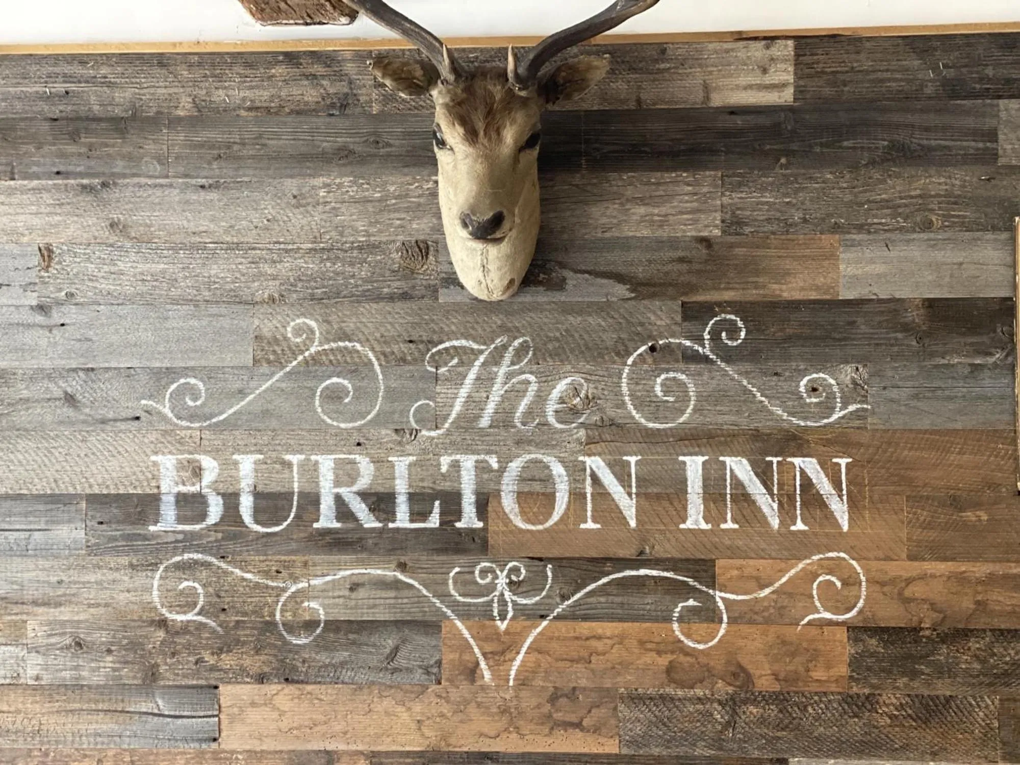 Property logo or sign in Burlton Inn