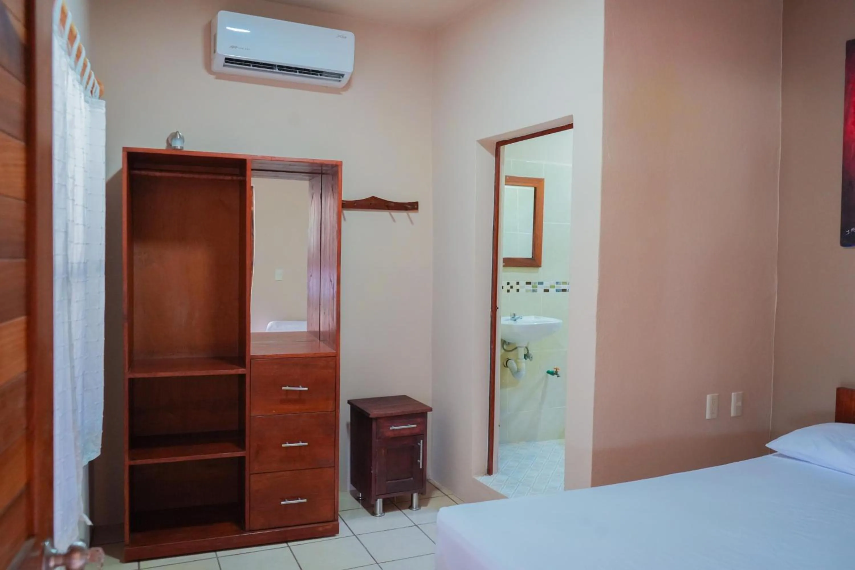 Bedroom in OYO Posada Magico