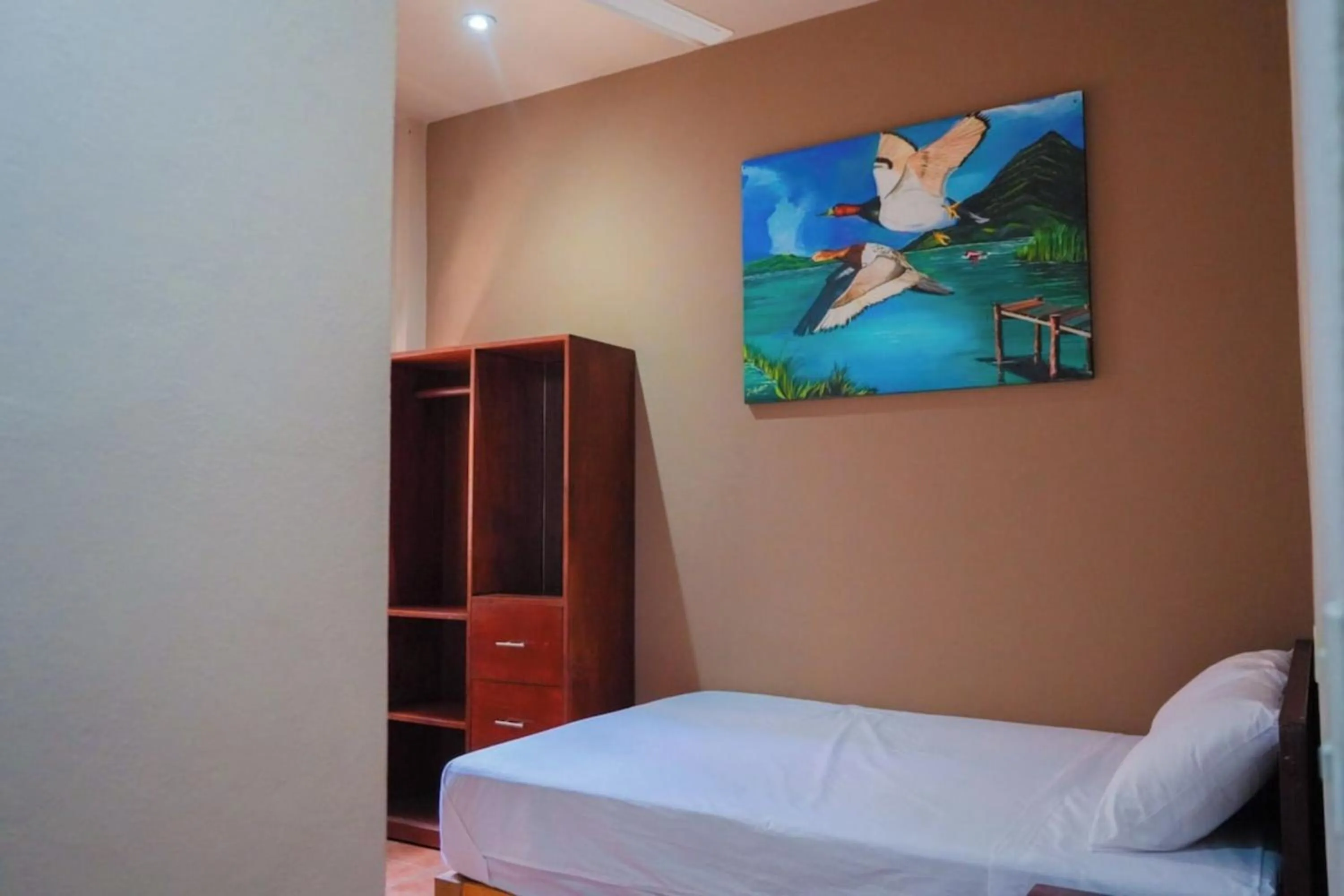 Bedroom in OYO Posada Magico