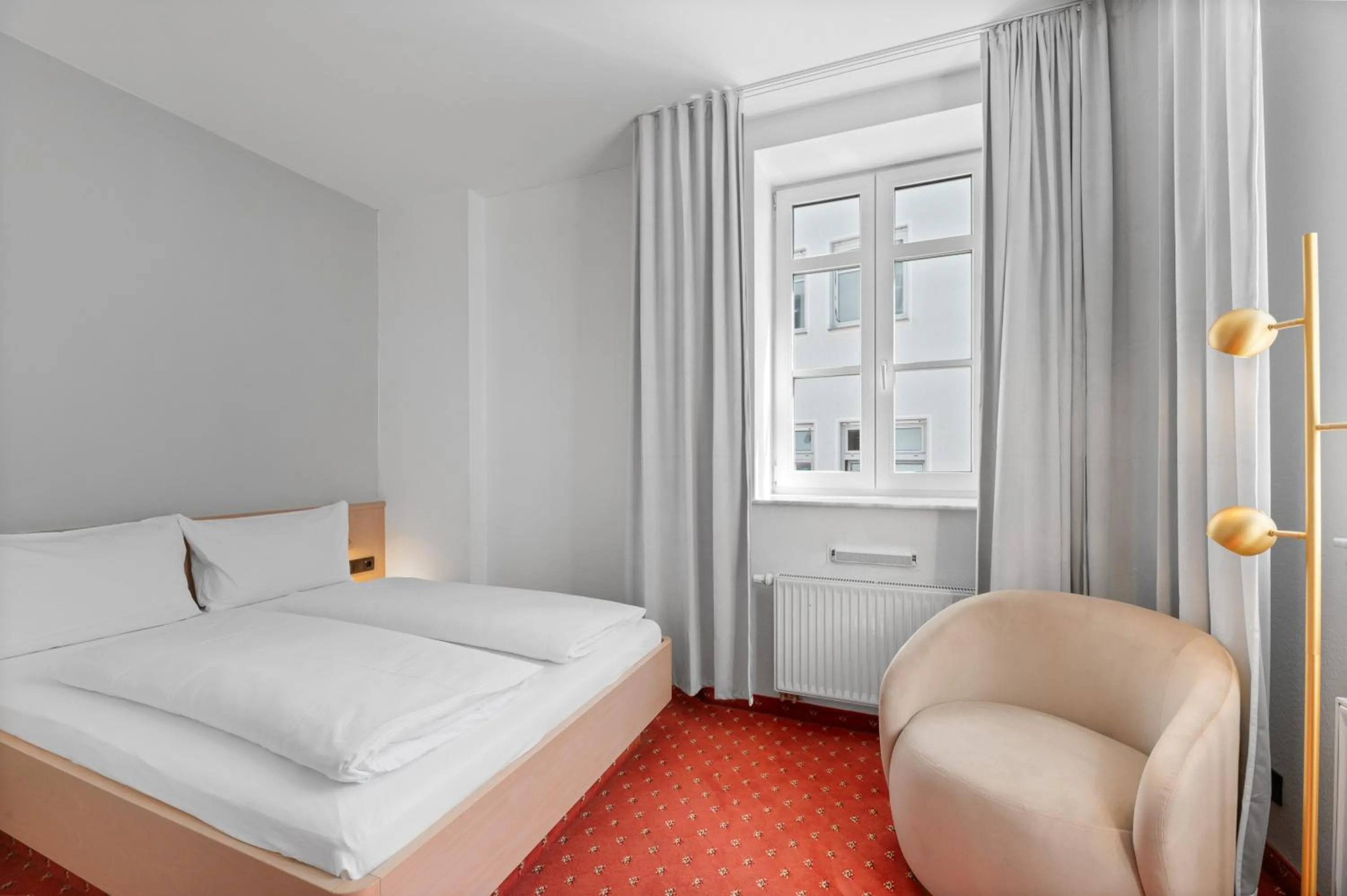 Bed in Gästehaus Andrea