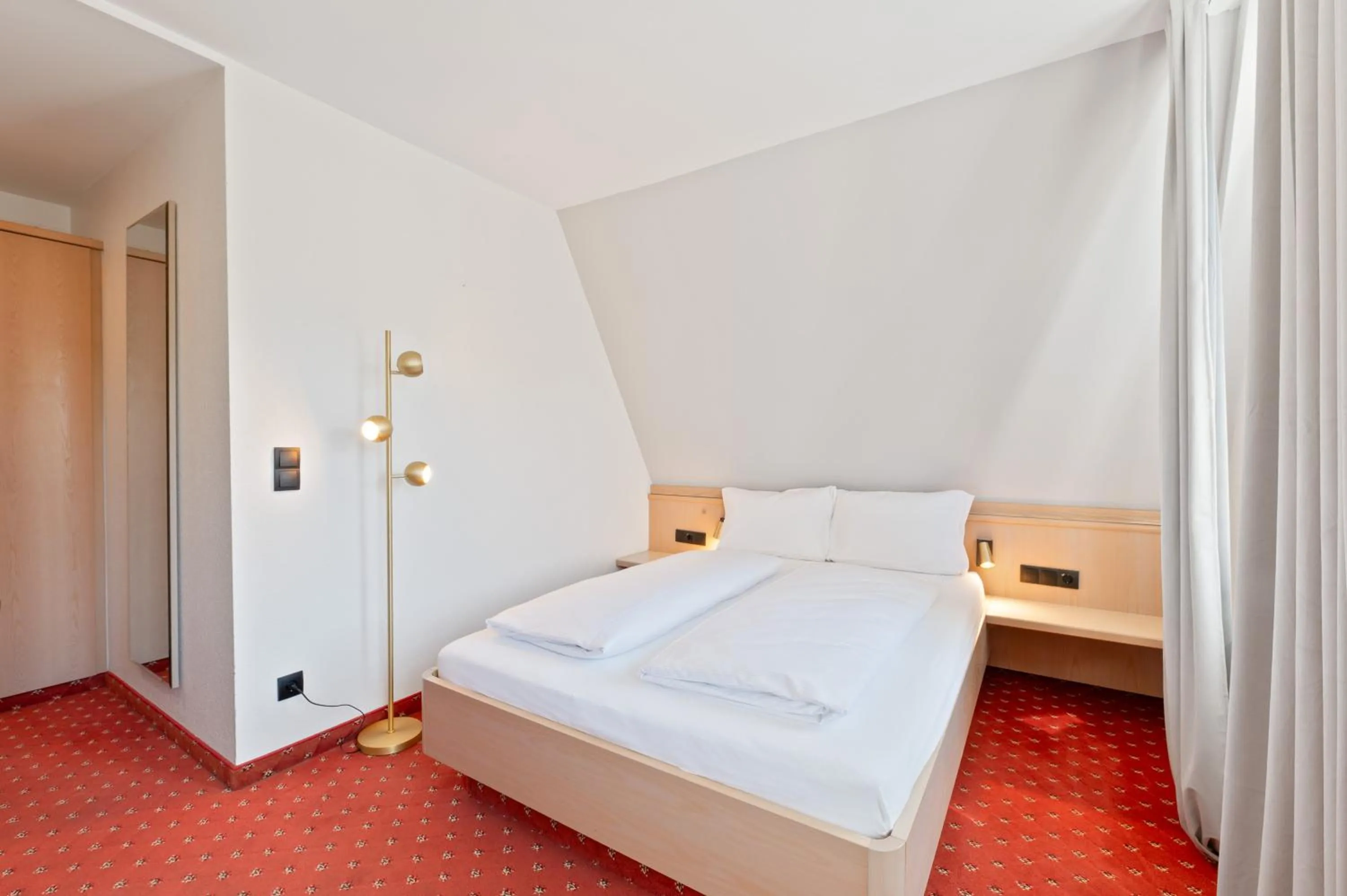 Bed in Gästehaus Andrea