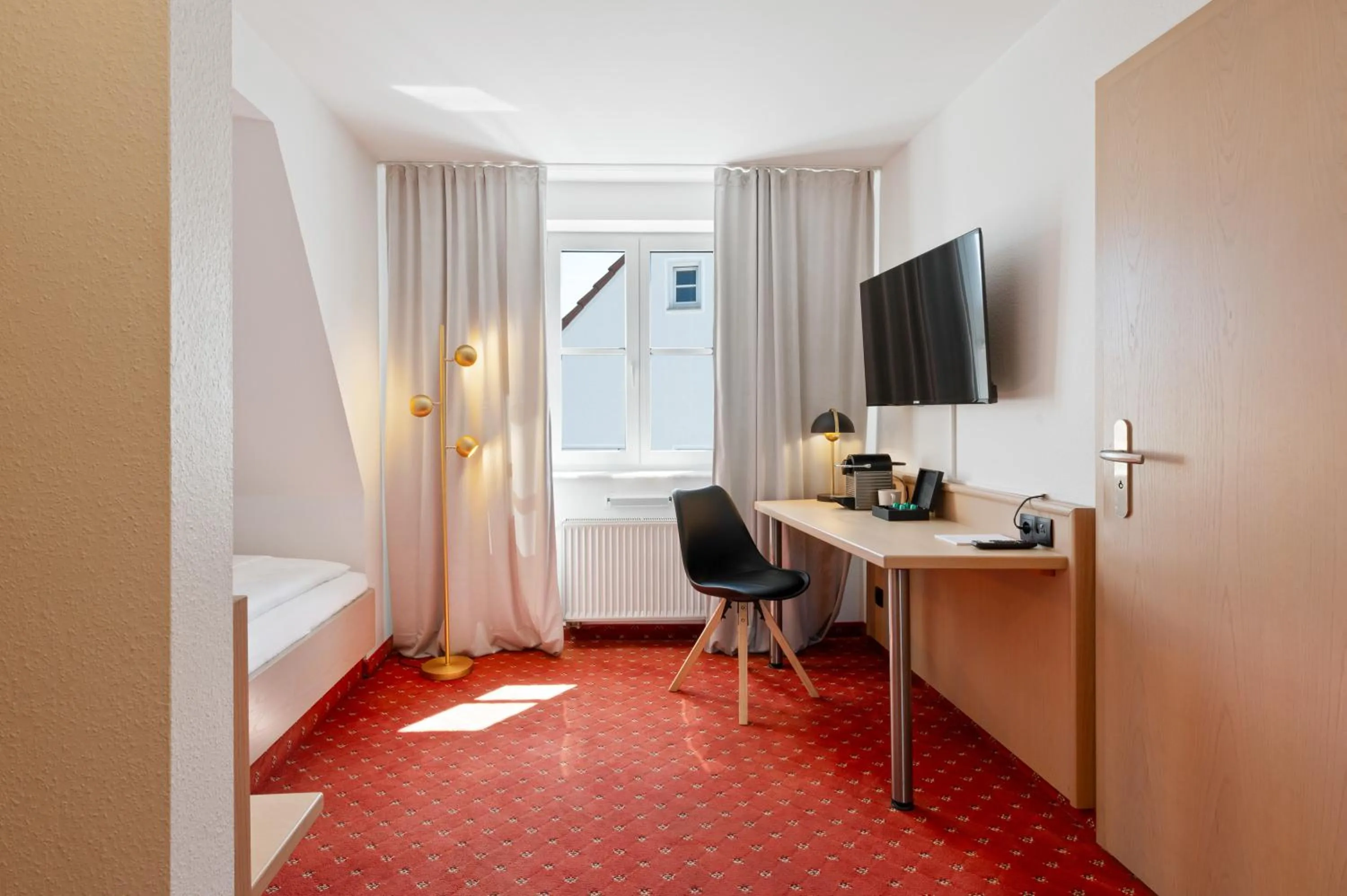 TV and multimedia, Bed in Gästehaus Andrea