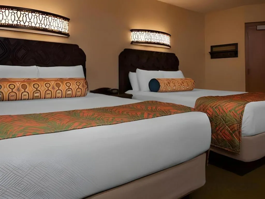 Bed in Disney's Caribbean Beach Resort