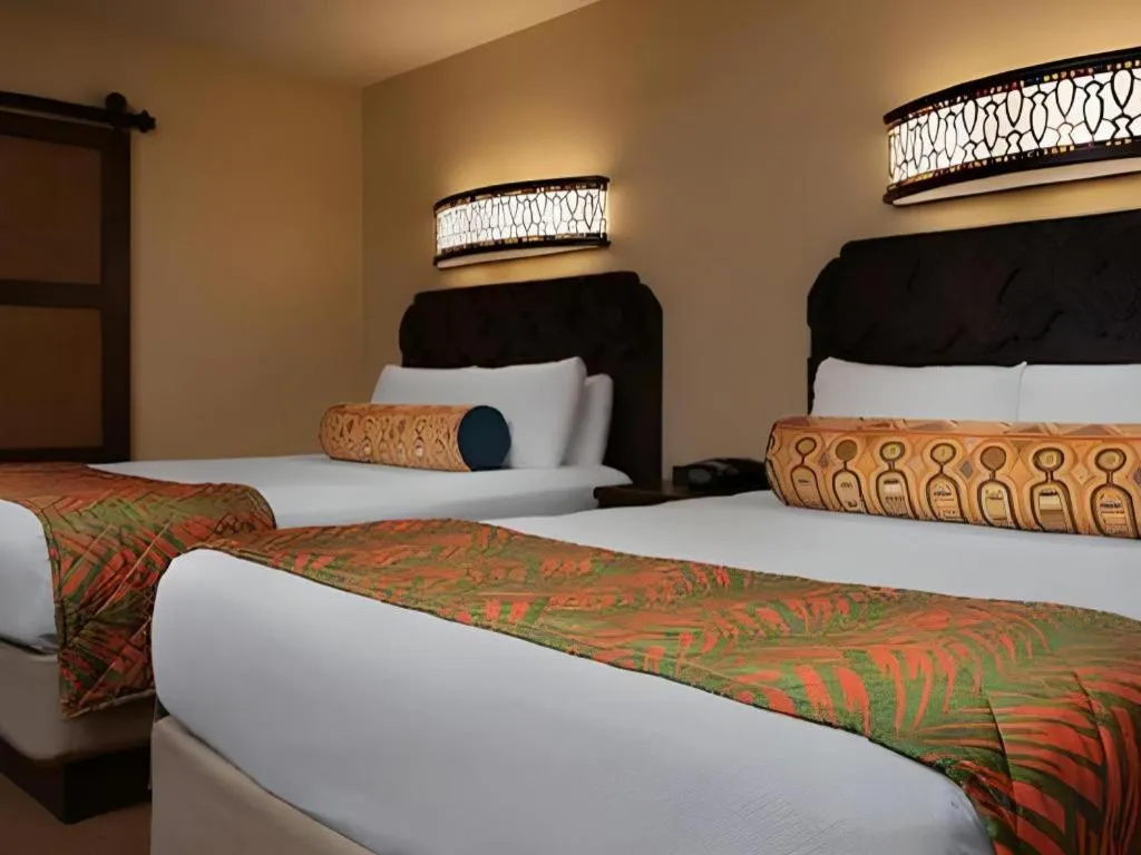 Bed in Disney's Caribbean Beach Resort