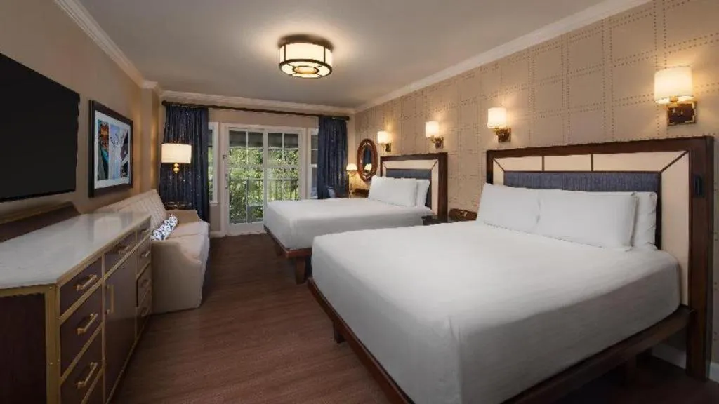 Bed in Disney's Yacht Club Resort