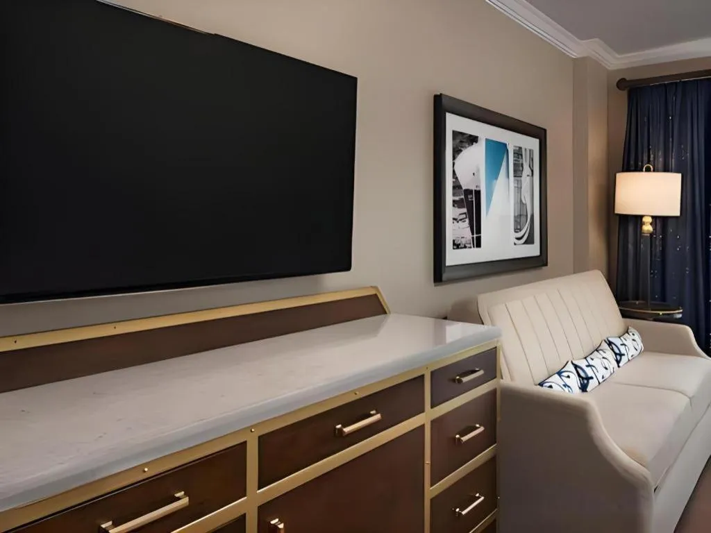 Bed in Disney's Yacht Club Resort