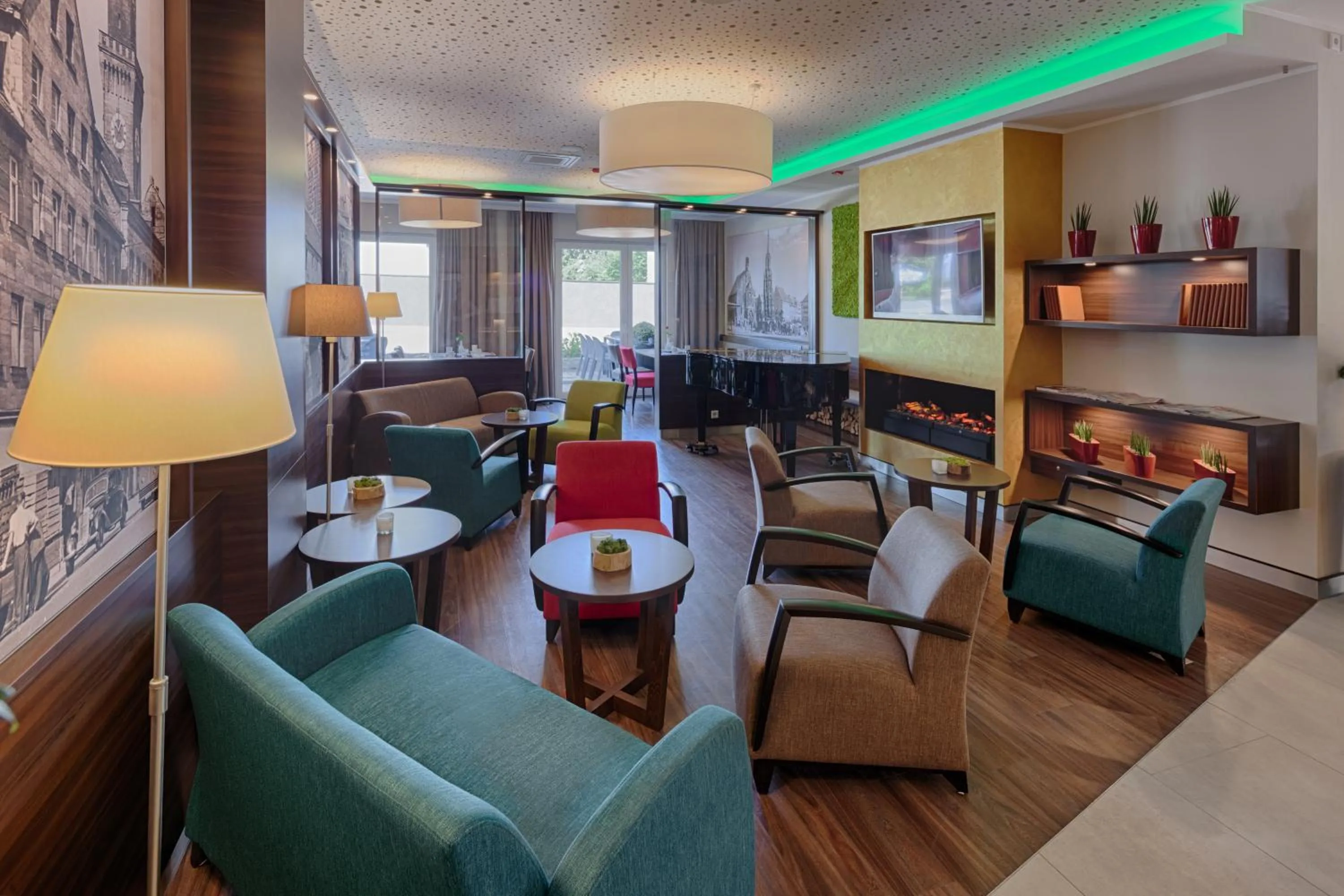 Communal lounge/ TV room in hotel bomonti Nürnberg West