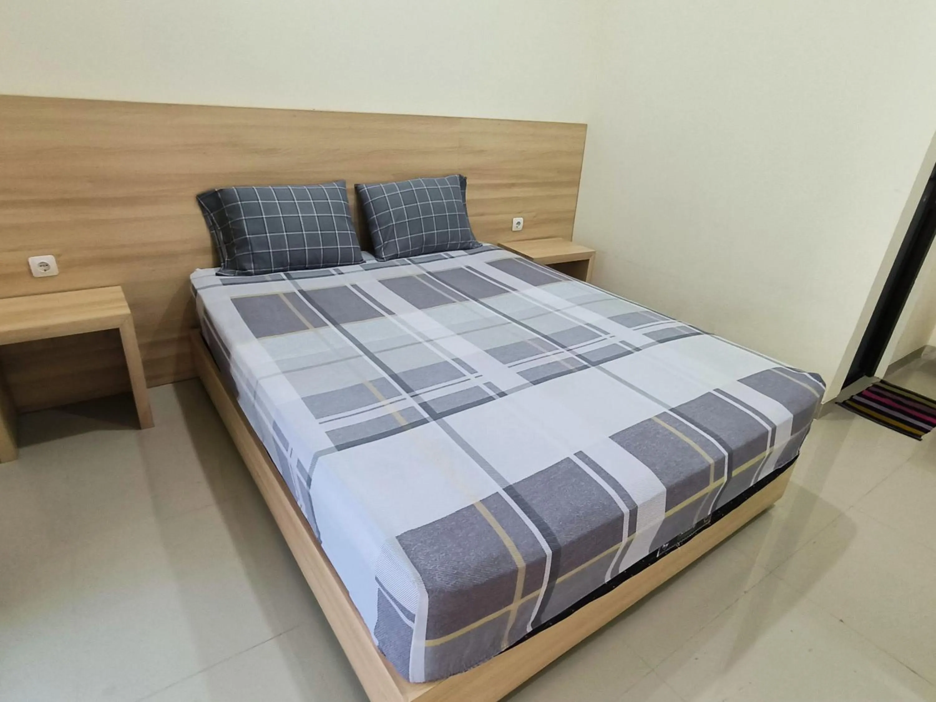 Bed in Tentrem Guesthouse Baru