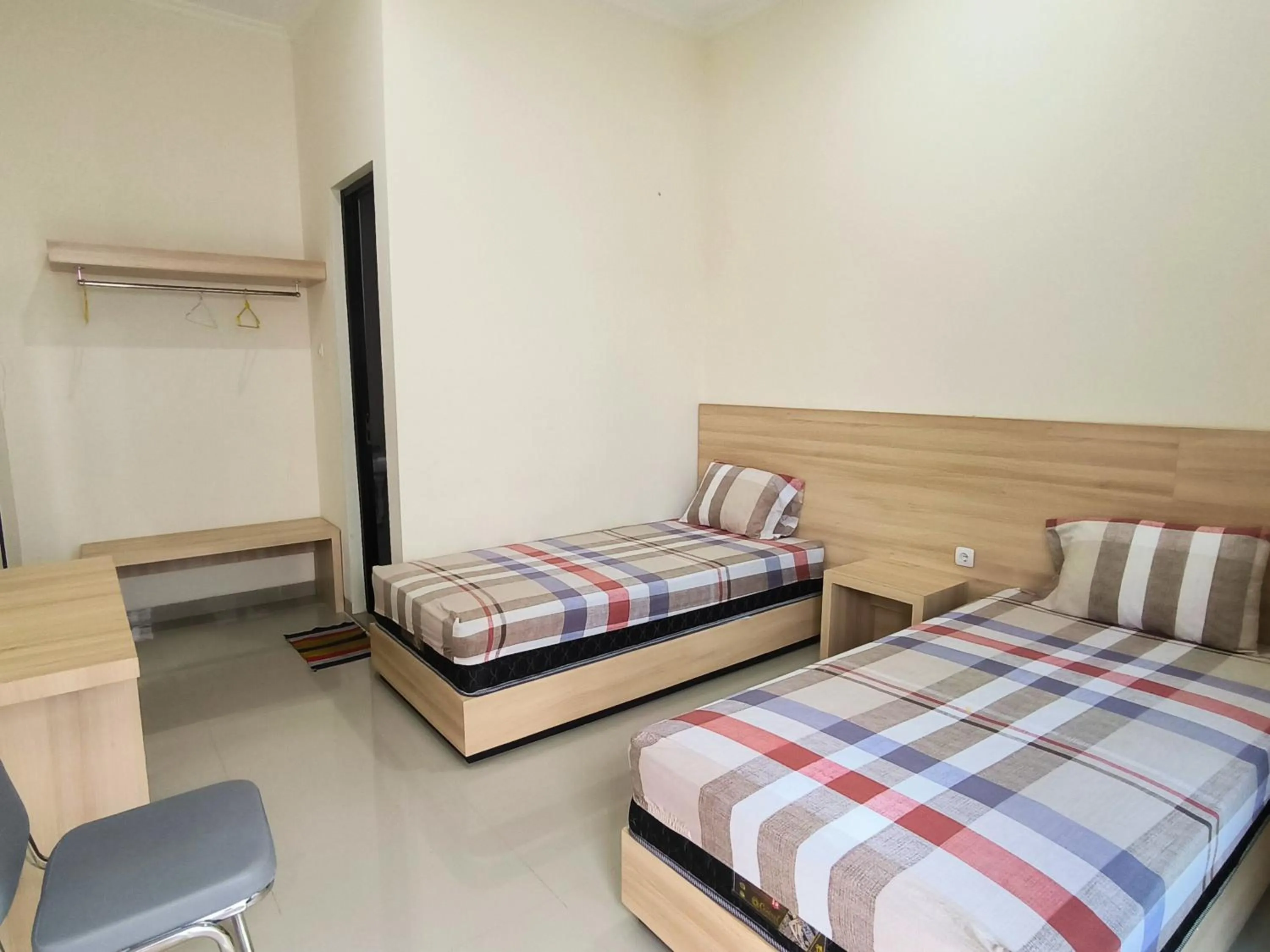 Bed in Tentrem Guesthouse Baru