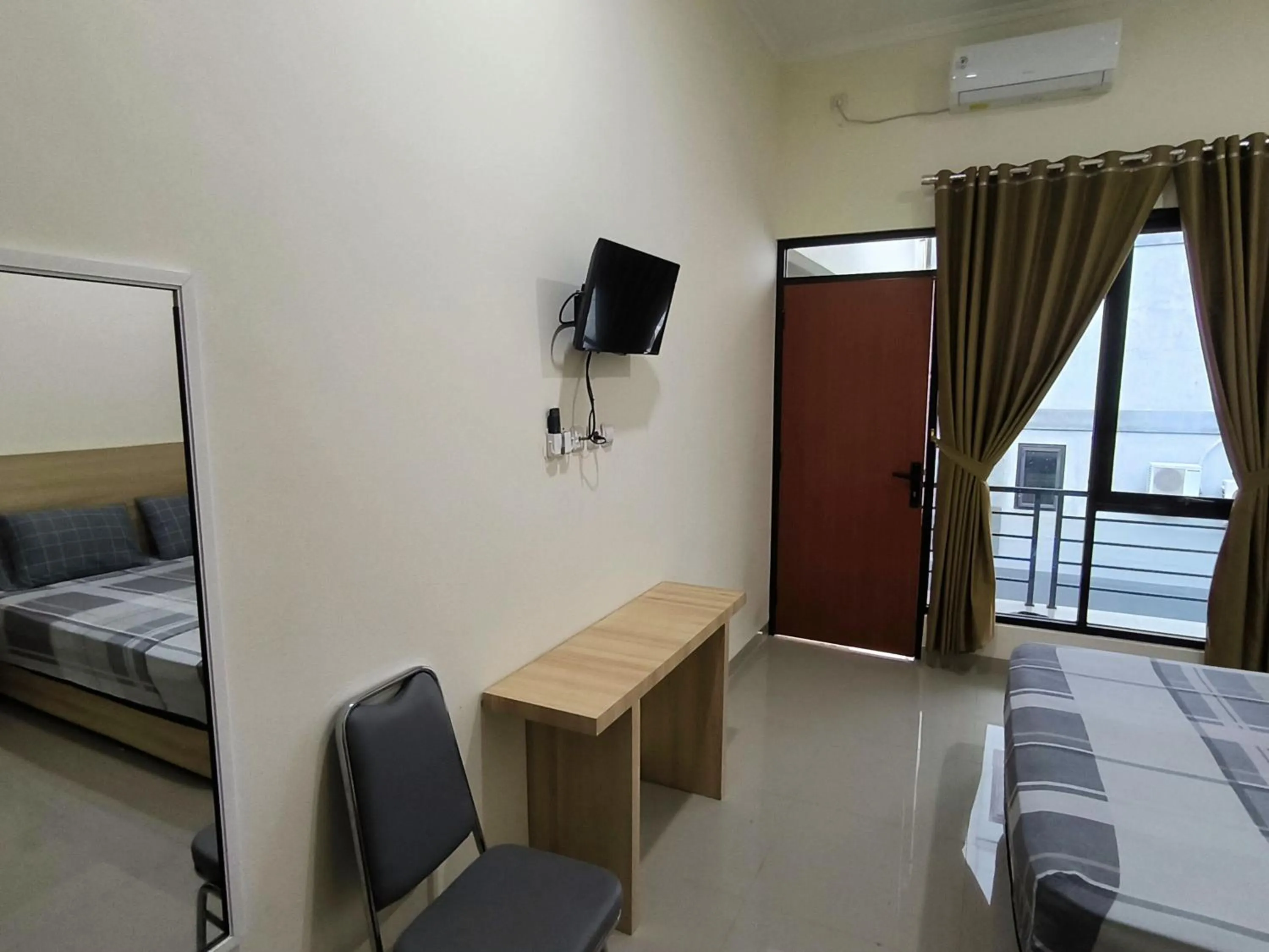 Bed in Tentrem Guesthouse Baru