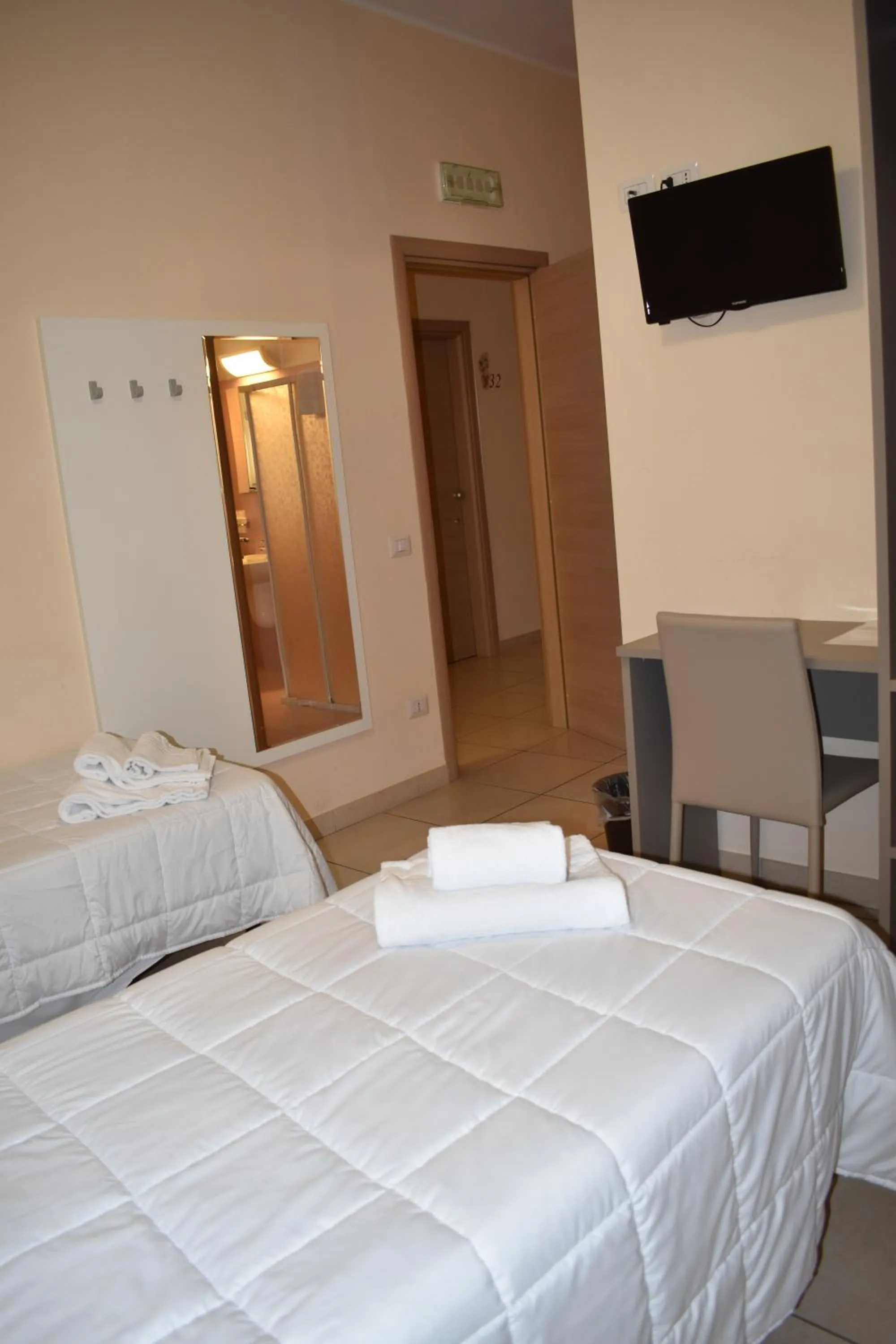 Bed in Pensione Piemonte Loreto