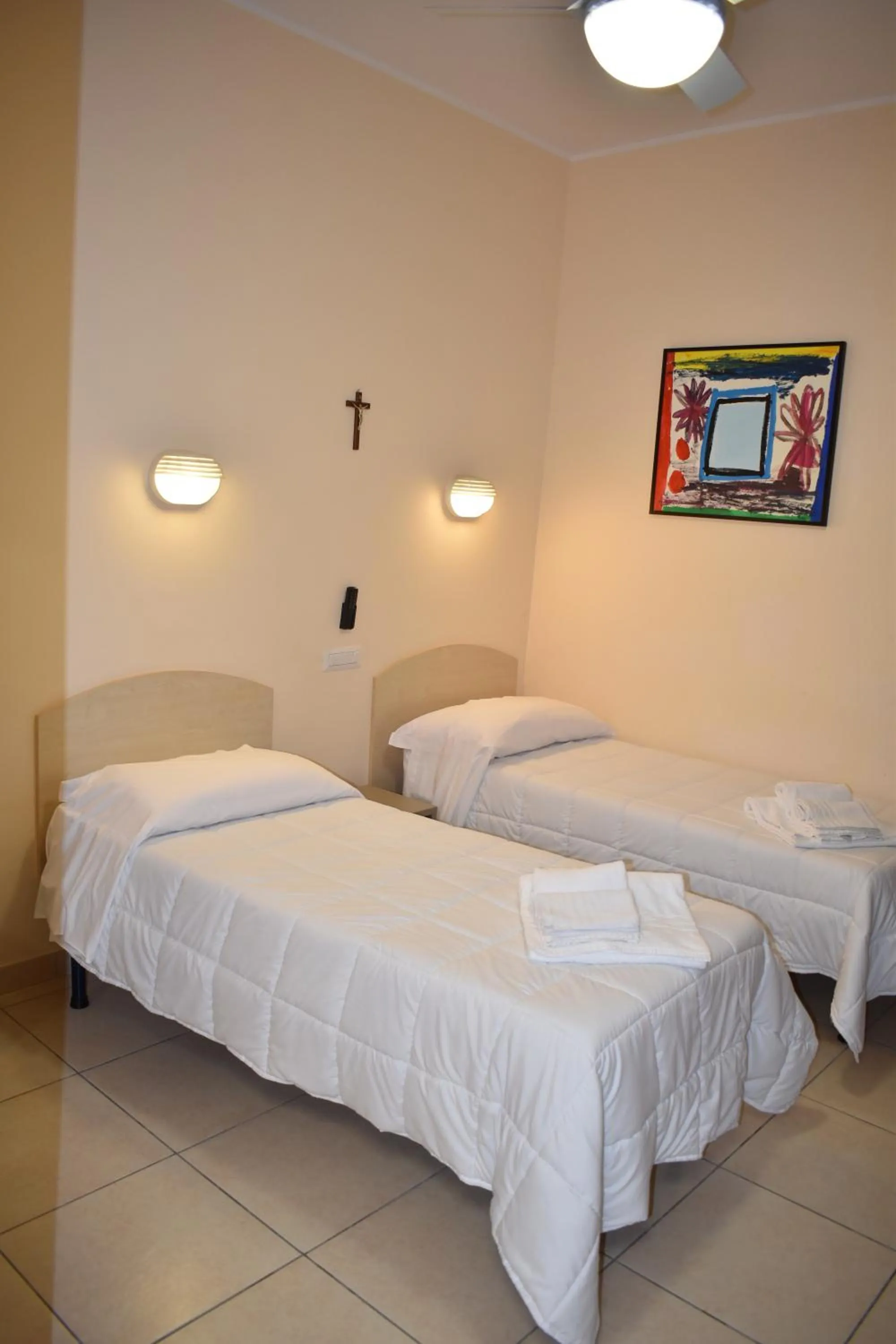 Bed in Pensione Piemonte Loreto