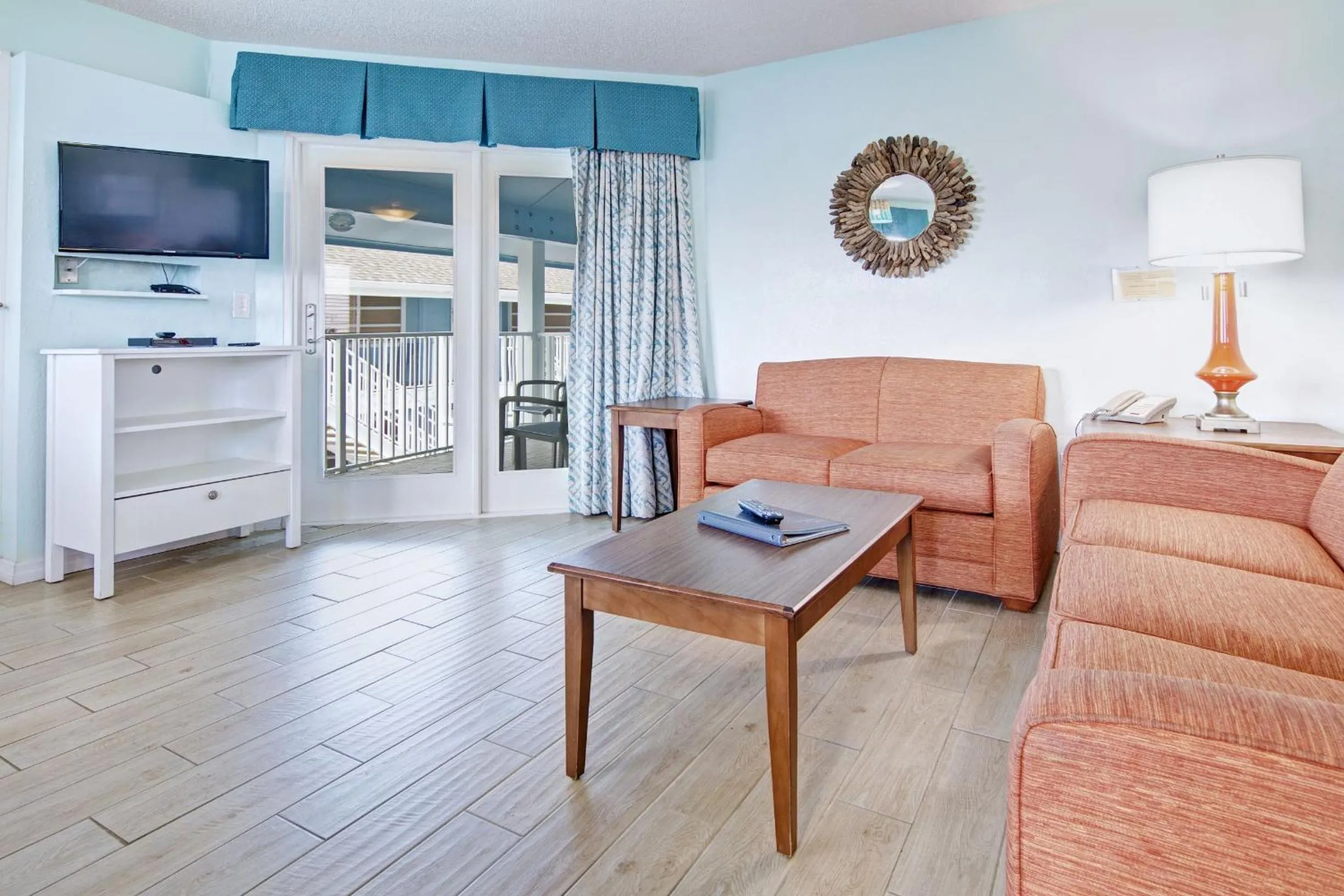 Living room in New Smyrna Waves by Exploria Resorts