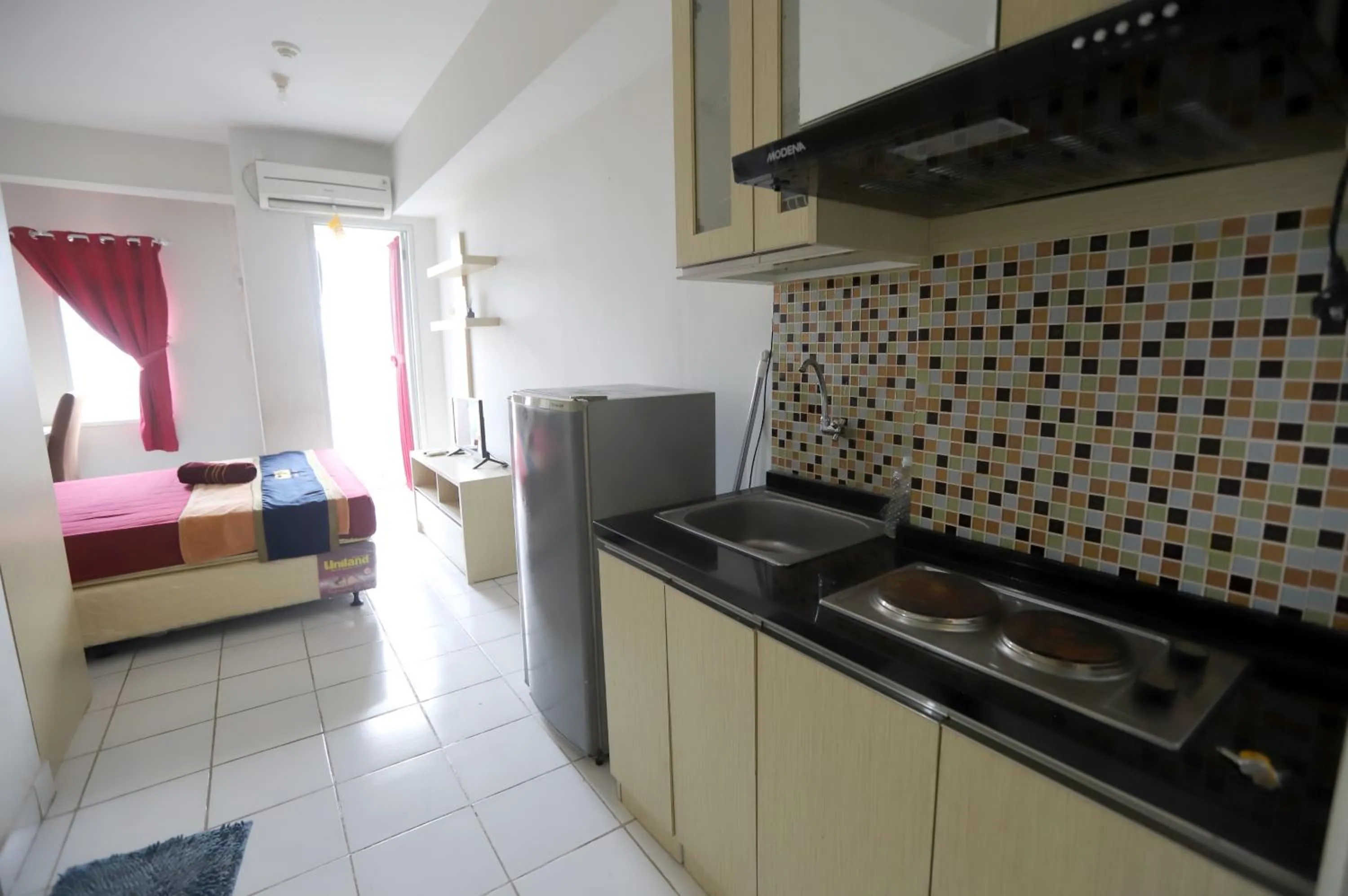 Bed in ARBA Dramaga Tower by Rendirooms