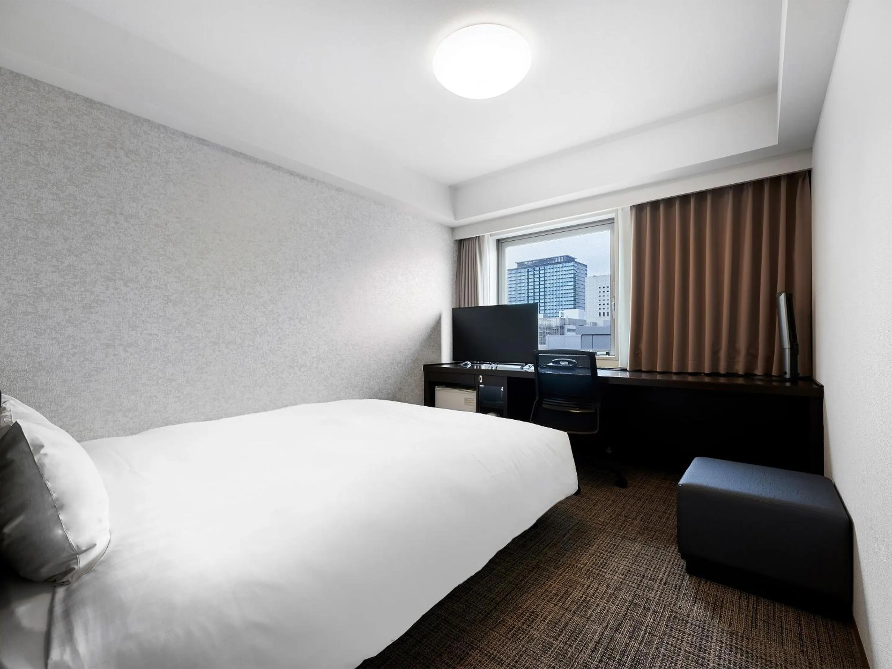 Bed in Daiwa Roynet Hotel Kawasaki