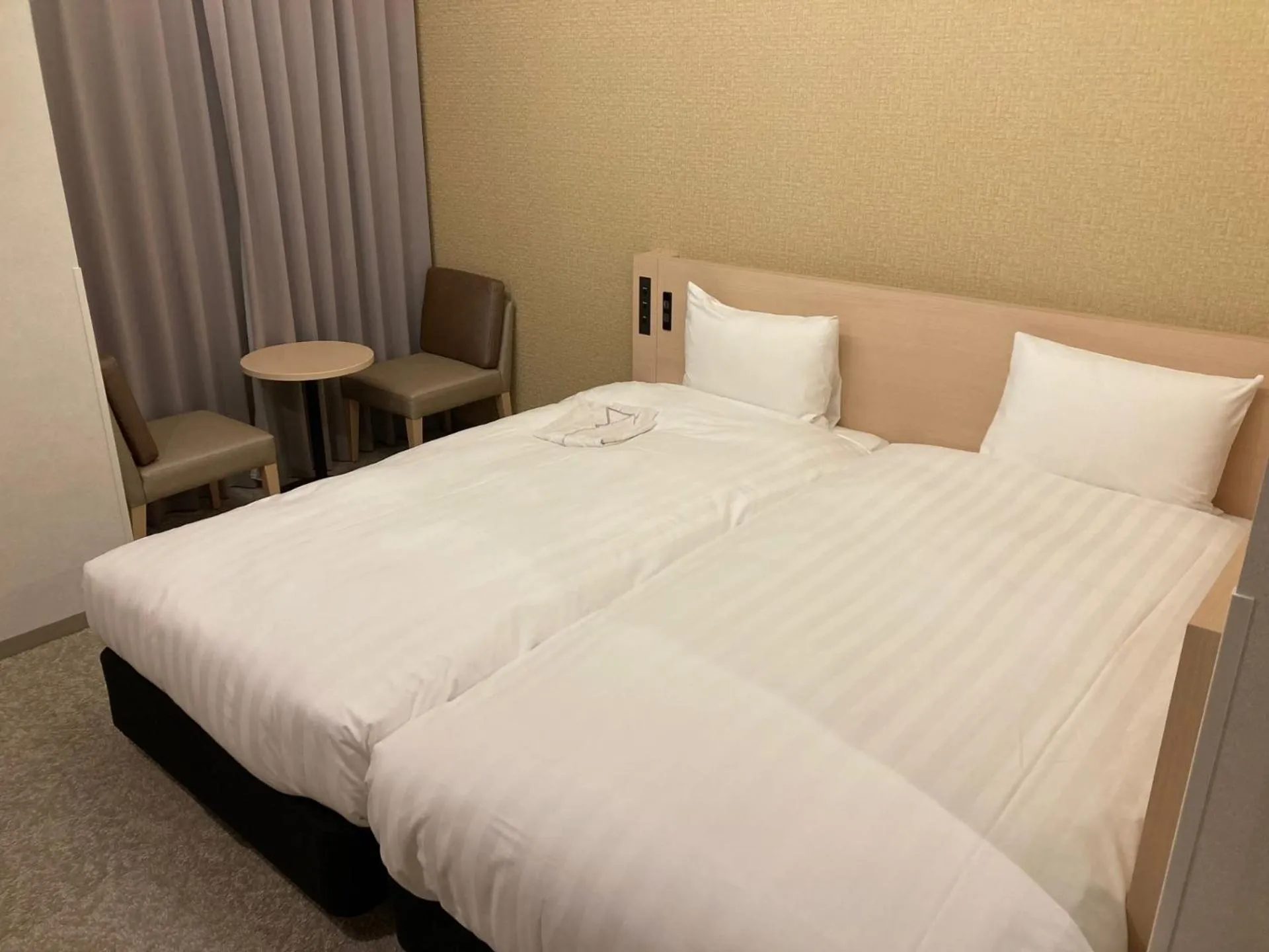 Bed in Daiwa Roynet Hotel Kawasaki