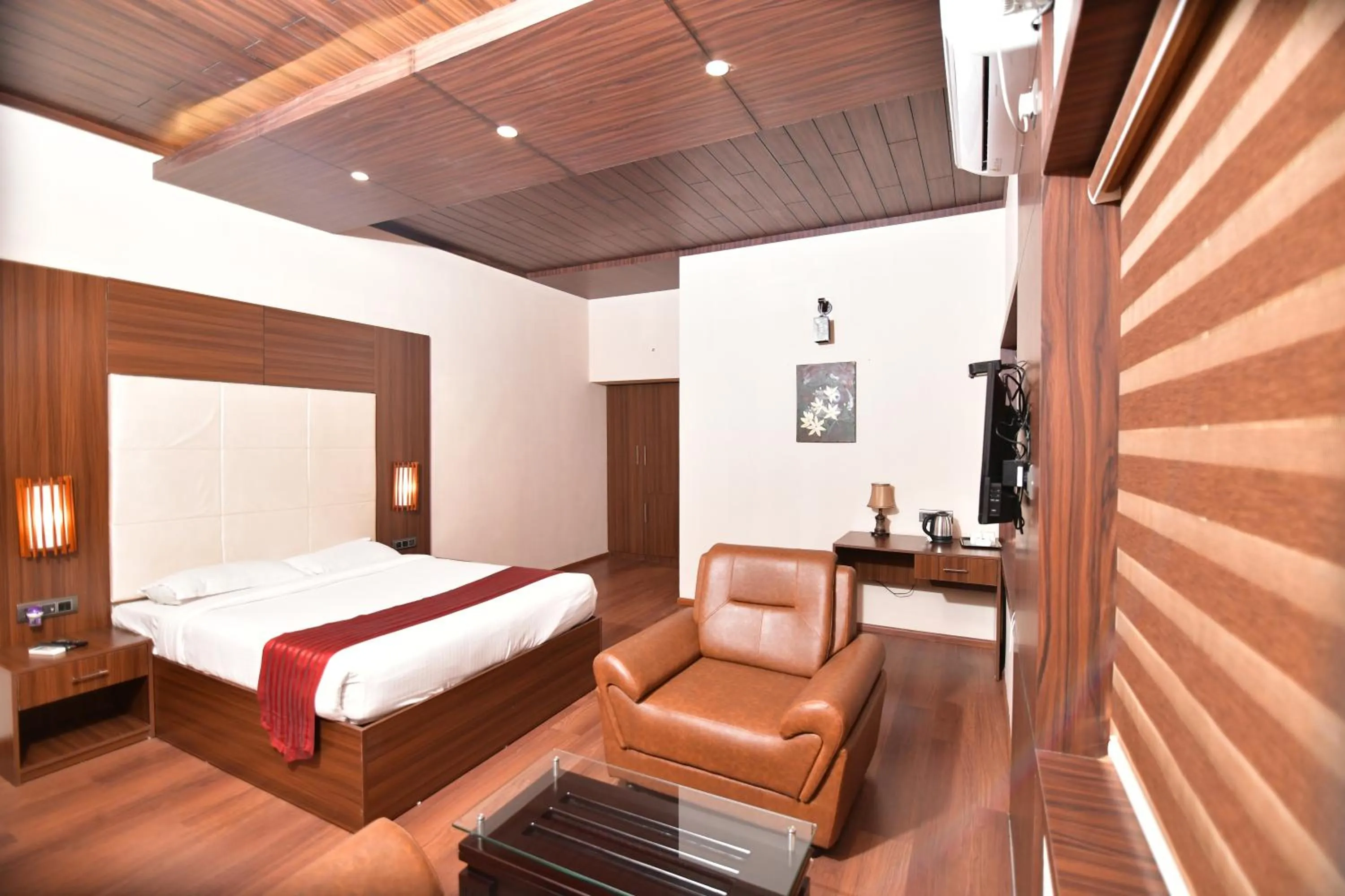 Bed in The Garuda Hotels