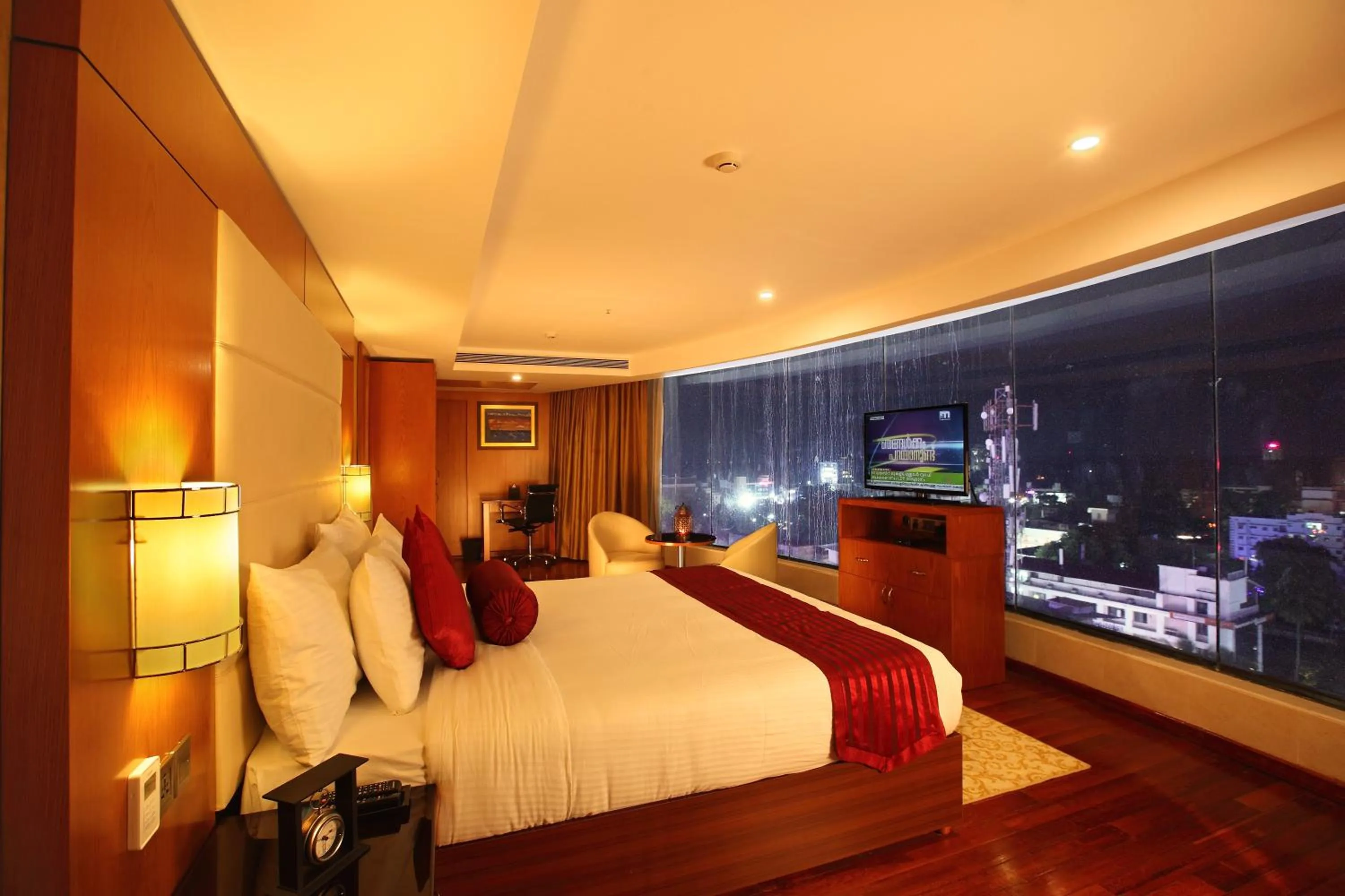 Bed in The Garuda Hotels