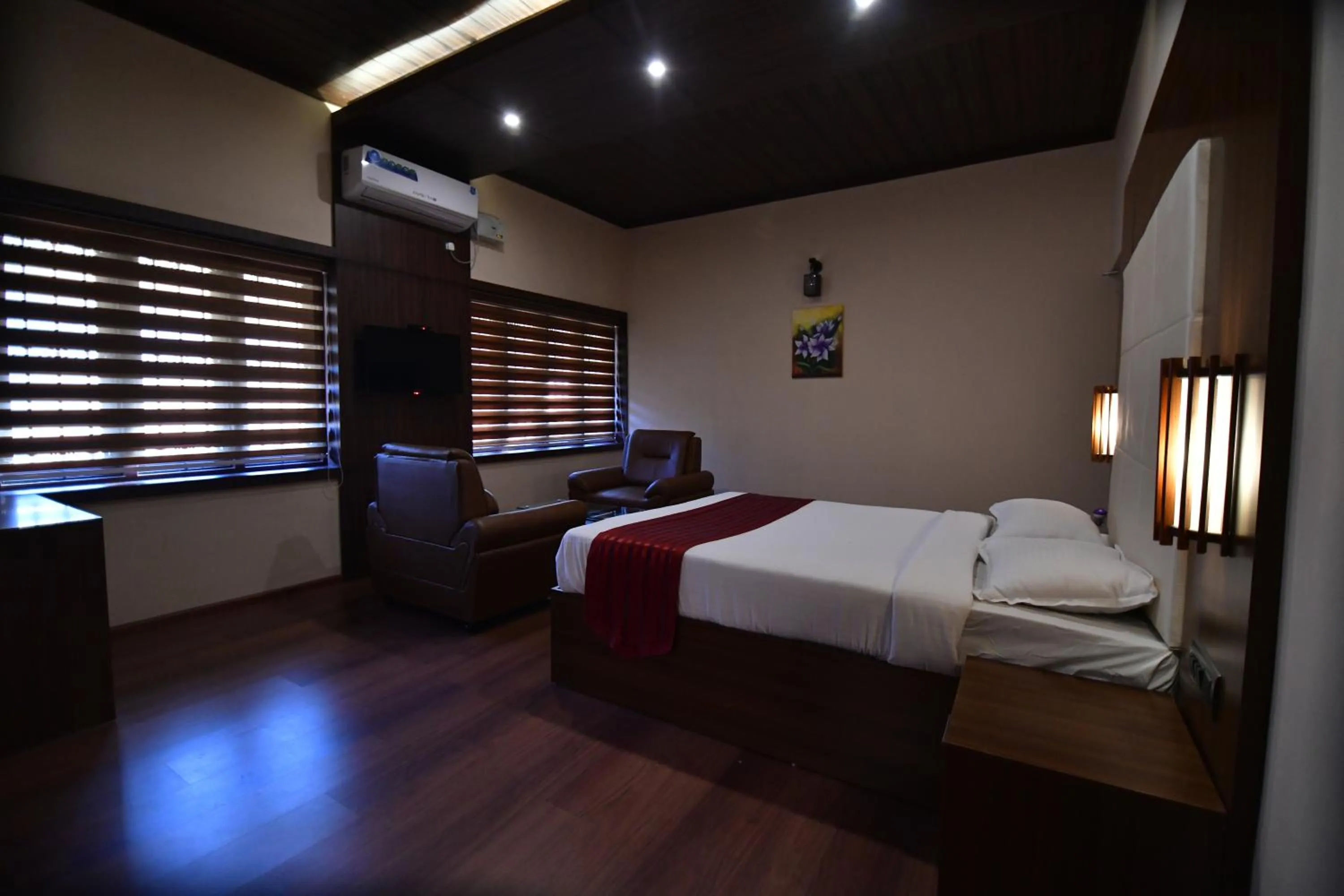 Bed in The Garuda Hotels