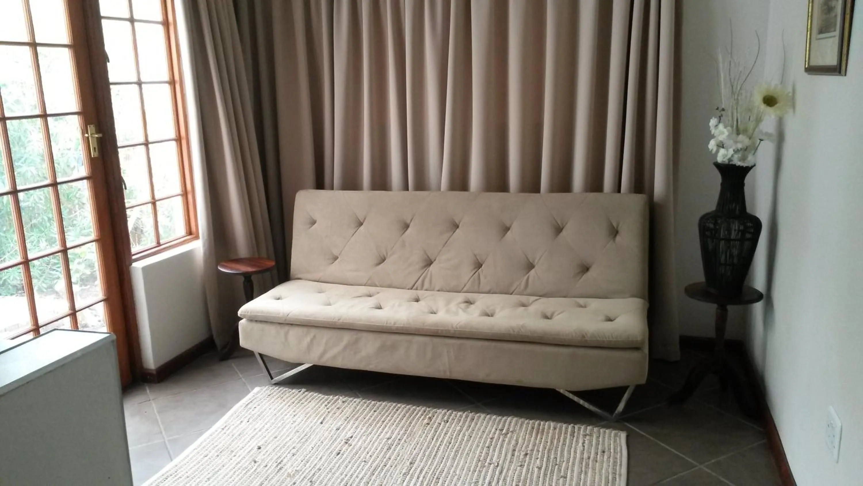 Living room in Queen Manor Boutique Guest House