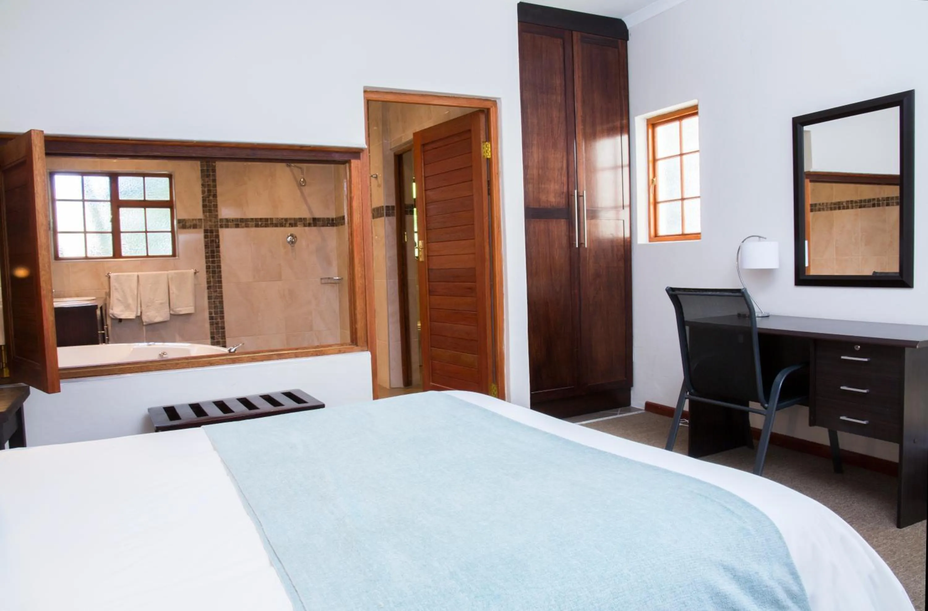 Bed in Queen Manor Boutique Guest House