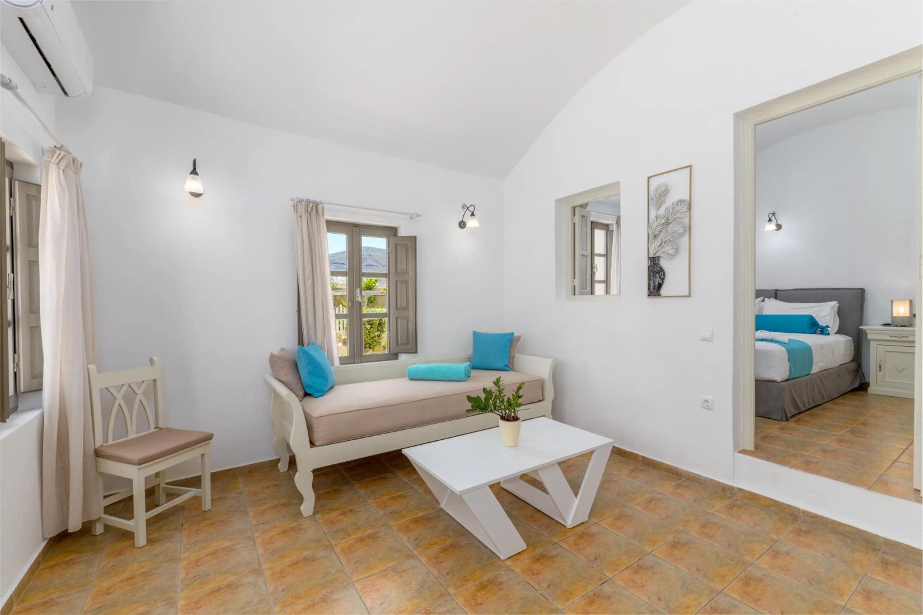 Bed in En Plo Boutique Suites