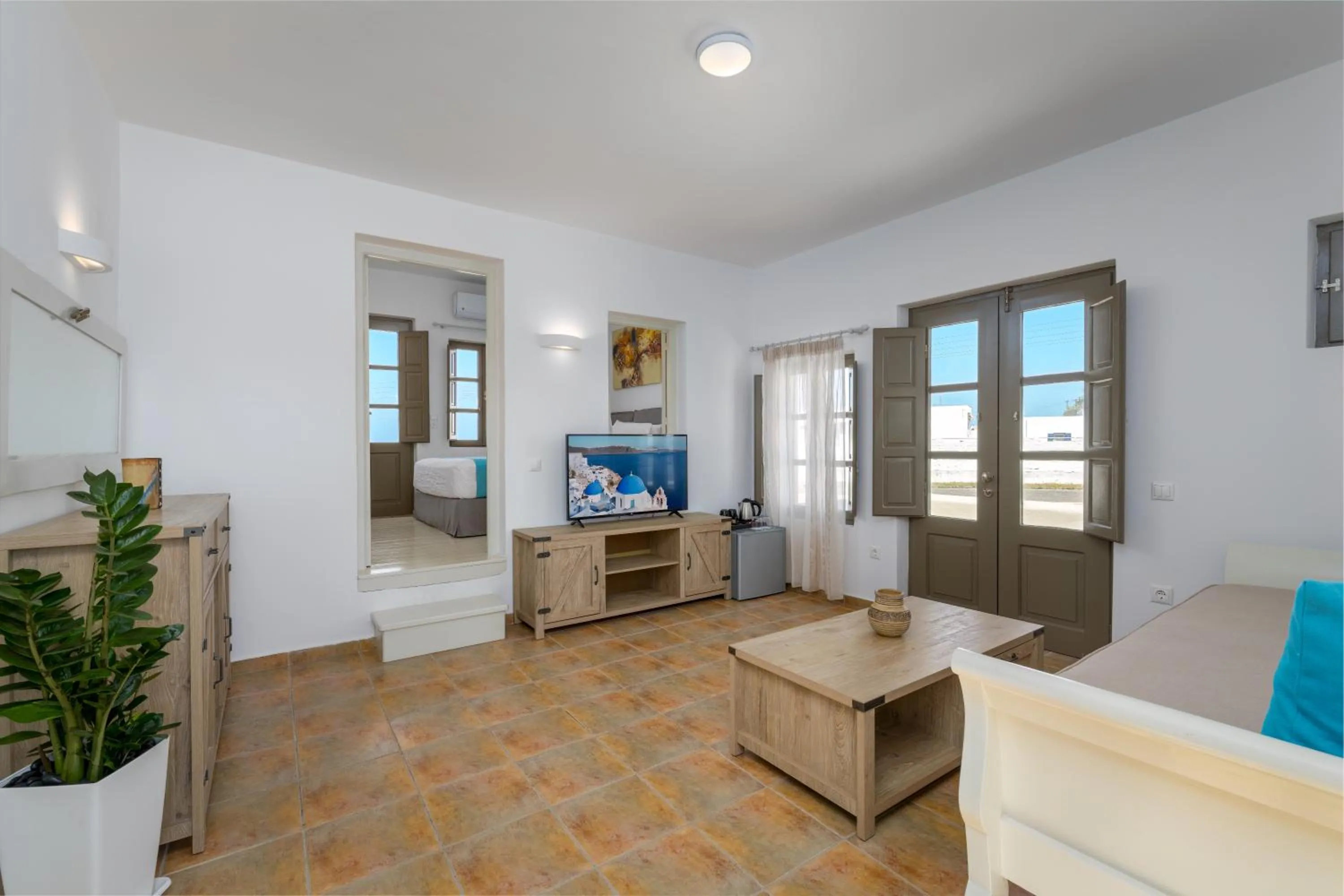 Bed in En Plo Boutique Suites