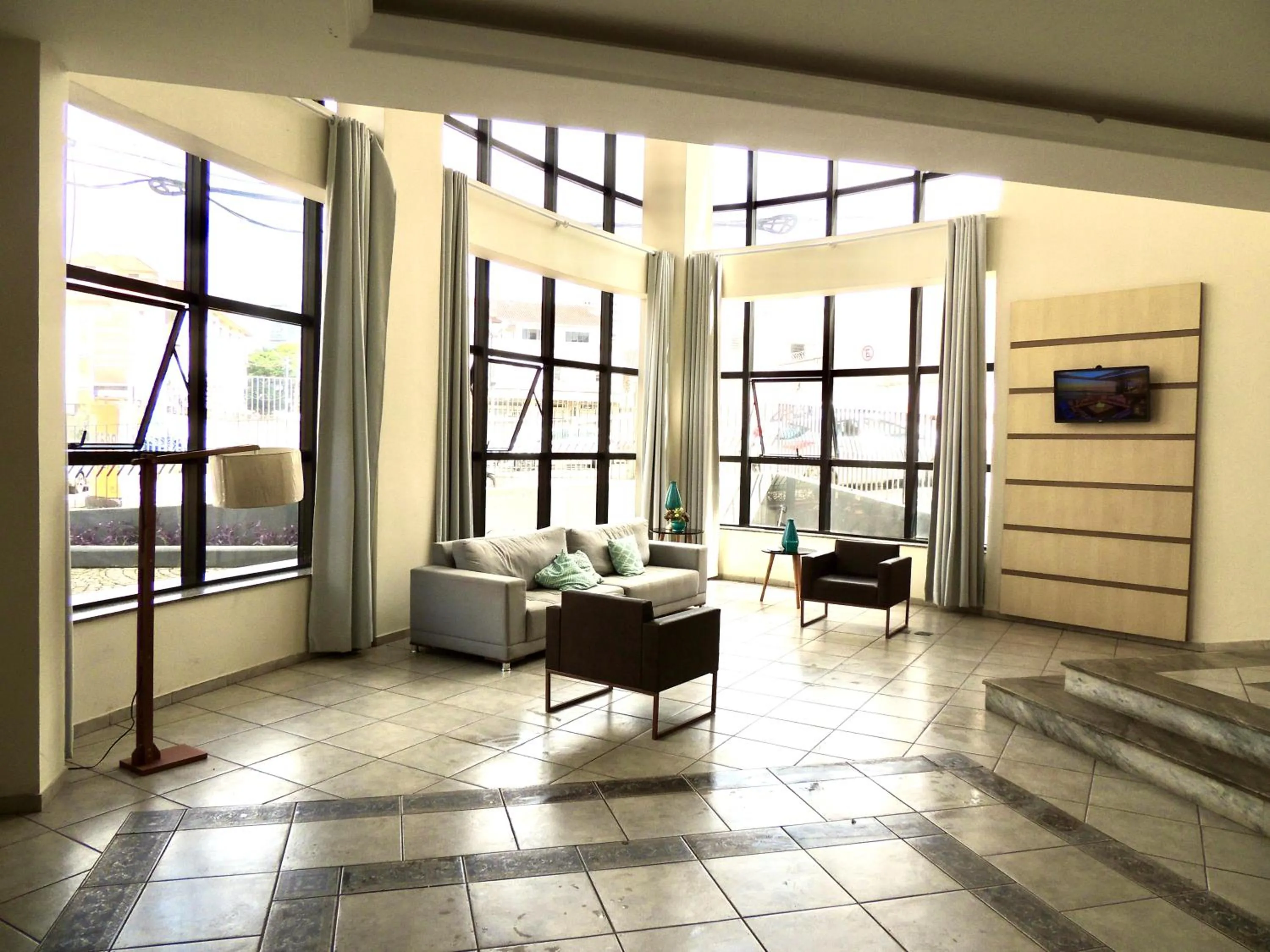 Lobby or reception in Pouso Alegre Hotel