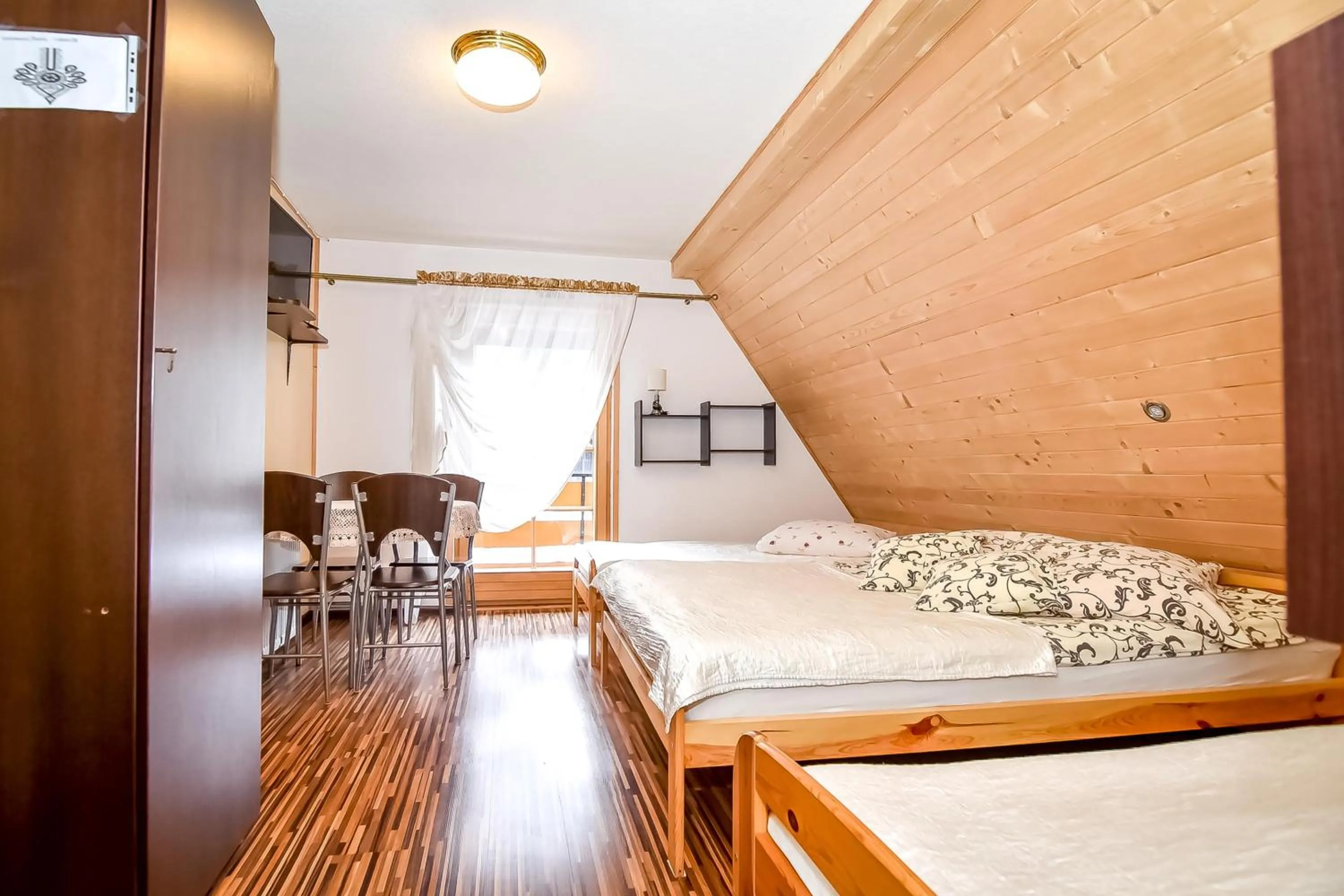 Bed in Ciukrowa Chatka Sauna & Jacuzzi
