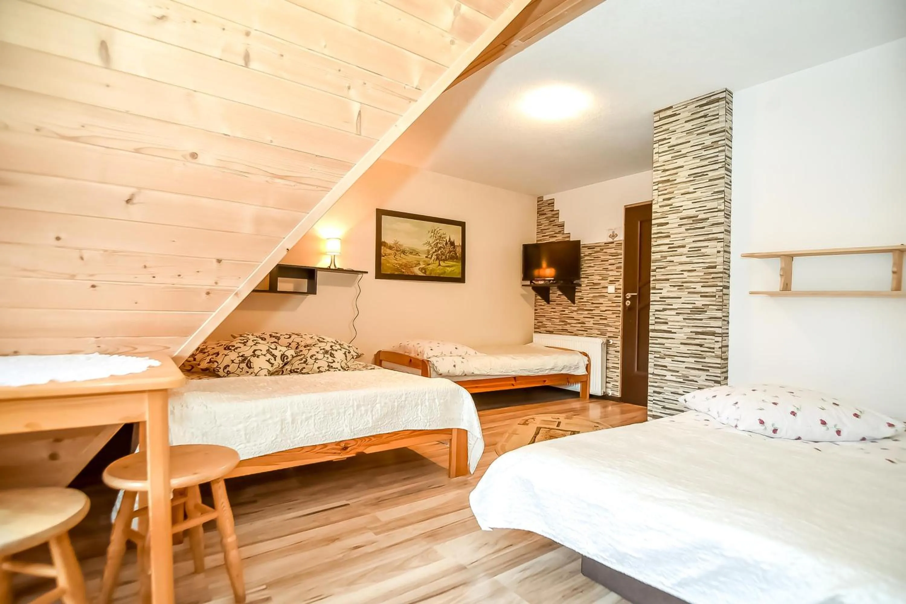 Bed in Ciukrowa Chatka Sauna & Jacuzzi