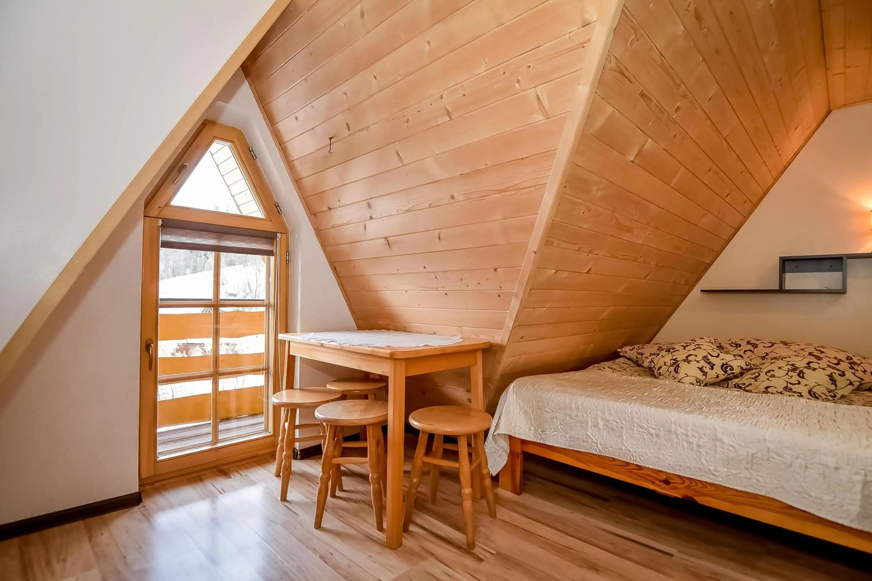 Bed in Ciukrowa Chatka Sauna & Jacuzzi