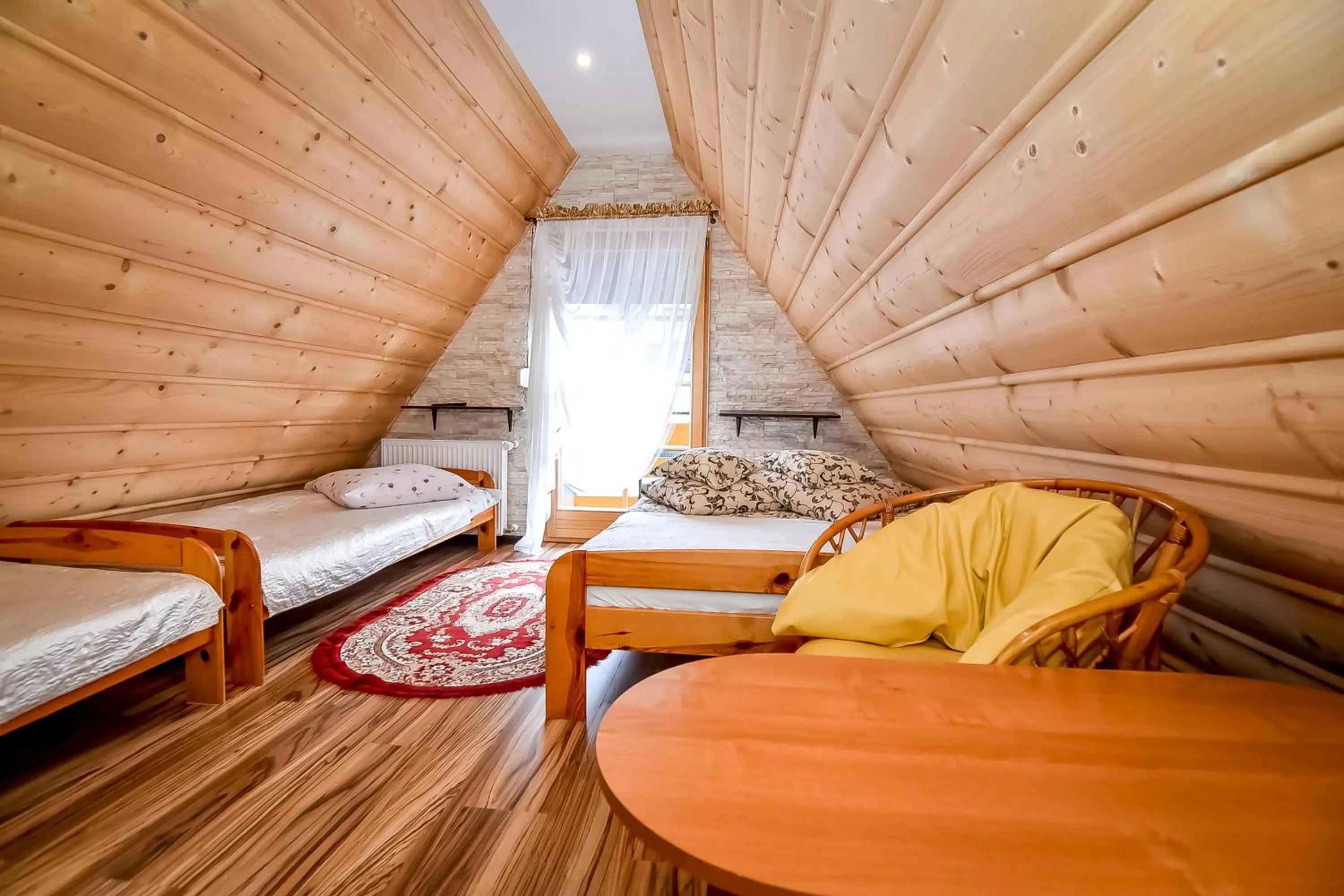 Bed in Ciukrowa Chatka Sauna & Jacuzzi