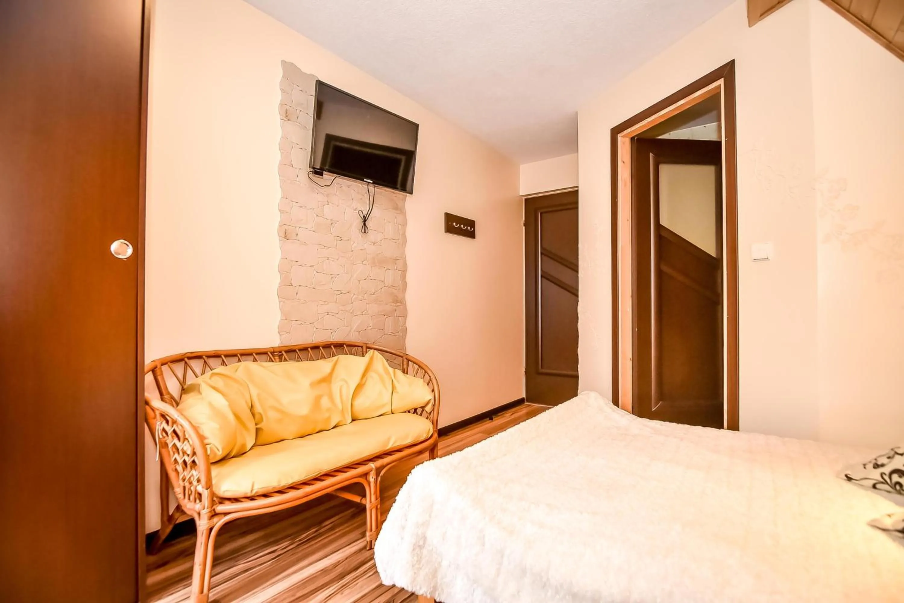 Bed in Ciukrowa Chatka Sauna & Jacuzzi