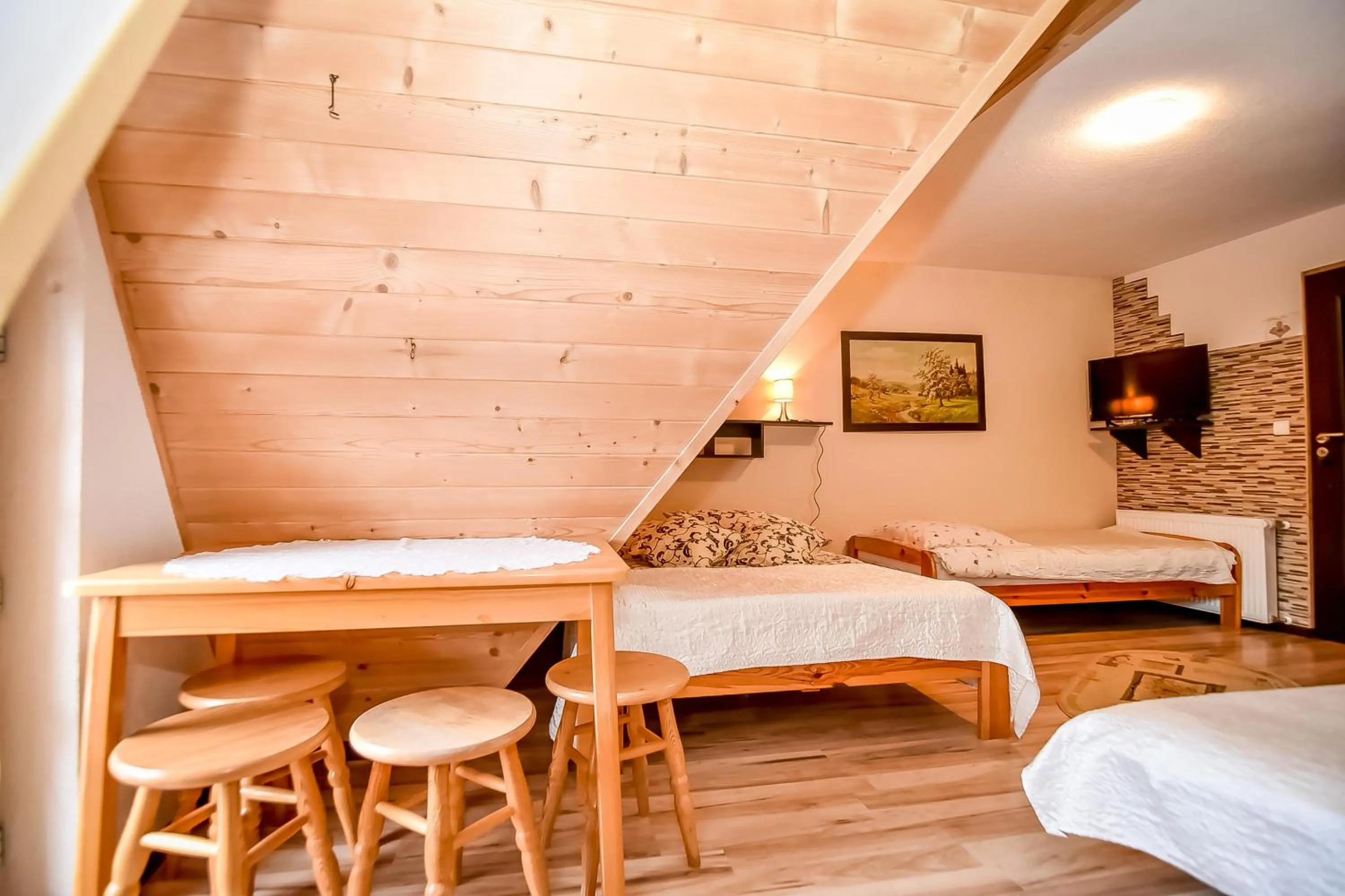 Bed in Ciukrowa Chatka Sauna & Jacuzzi