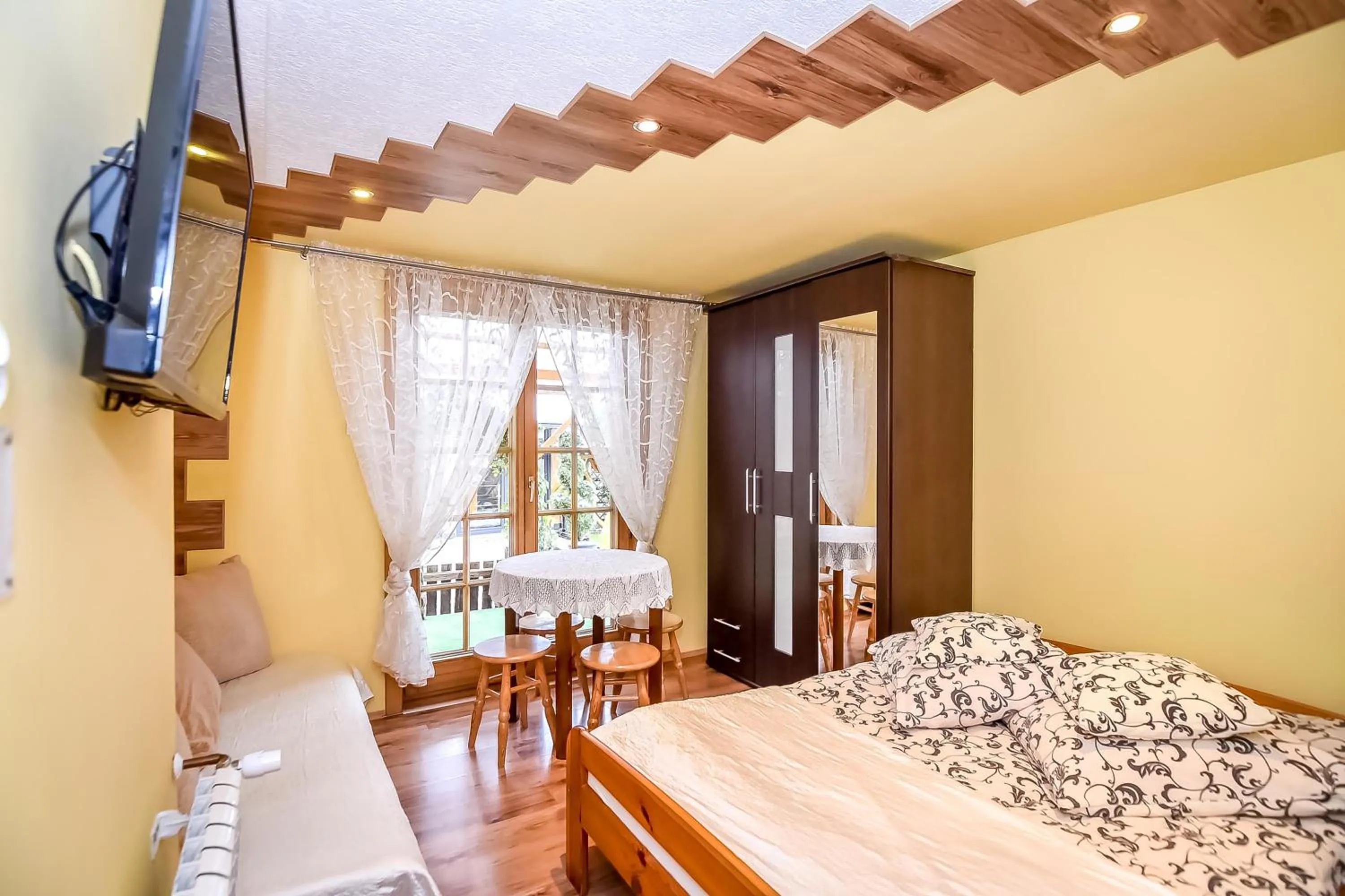 Bed in Ciukrowa Chatka Sauna & Jacuzzi