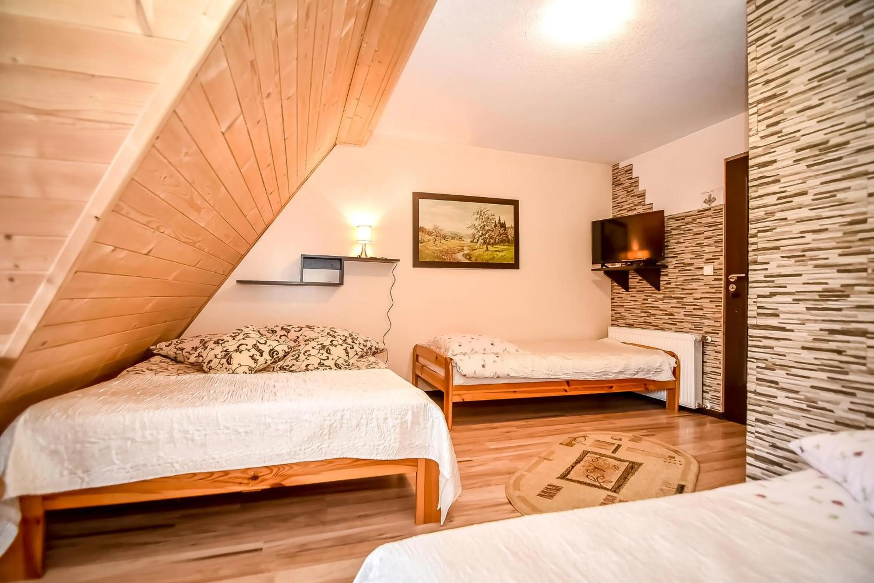 Bed in Ciukrowa Chatka Sauna & Jacuzzi