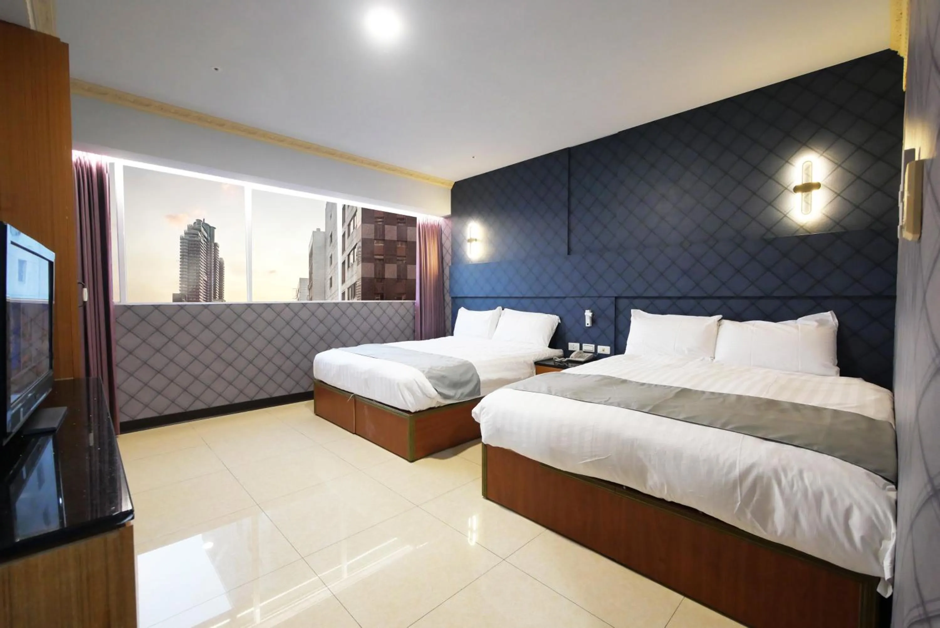 Bed in I Hi Loveriver Hotel