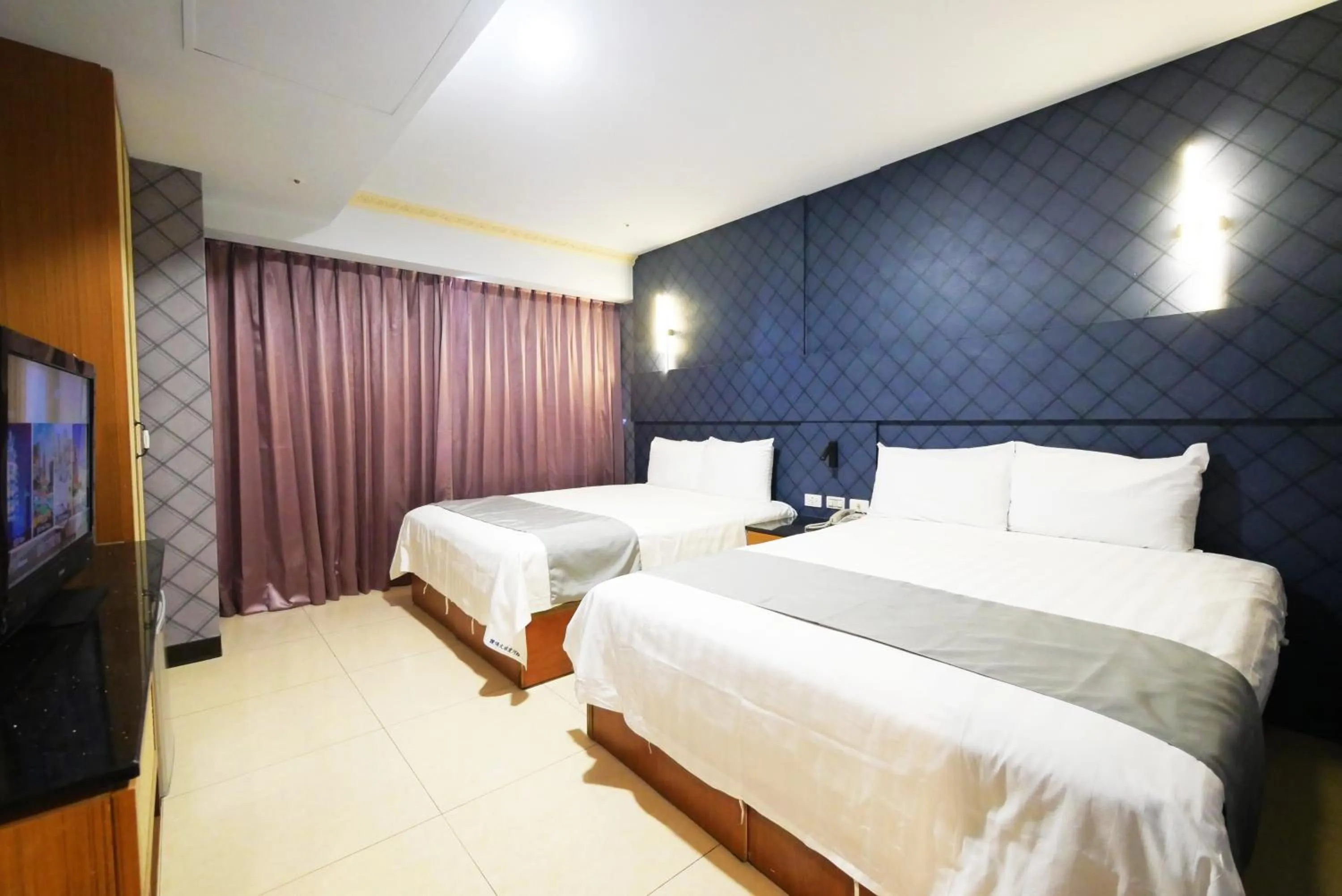 Bed in I Hi Loveriver Hotel