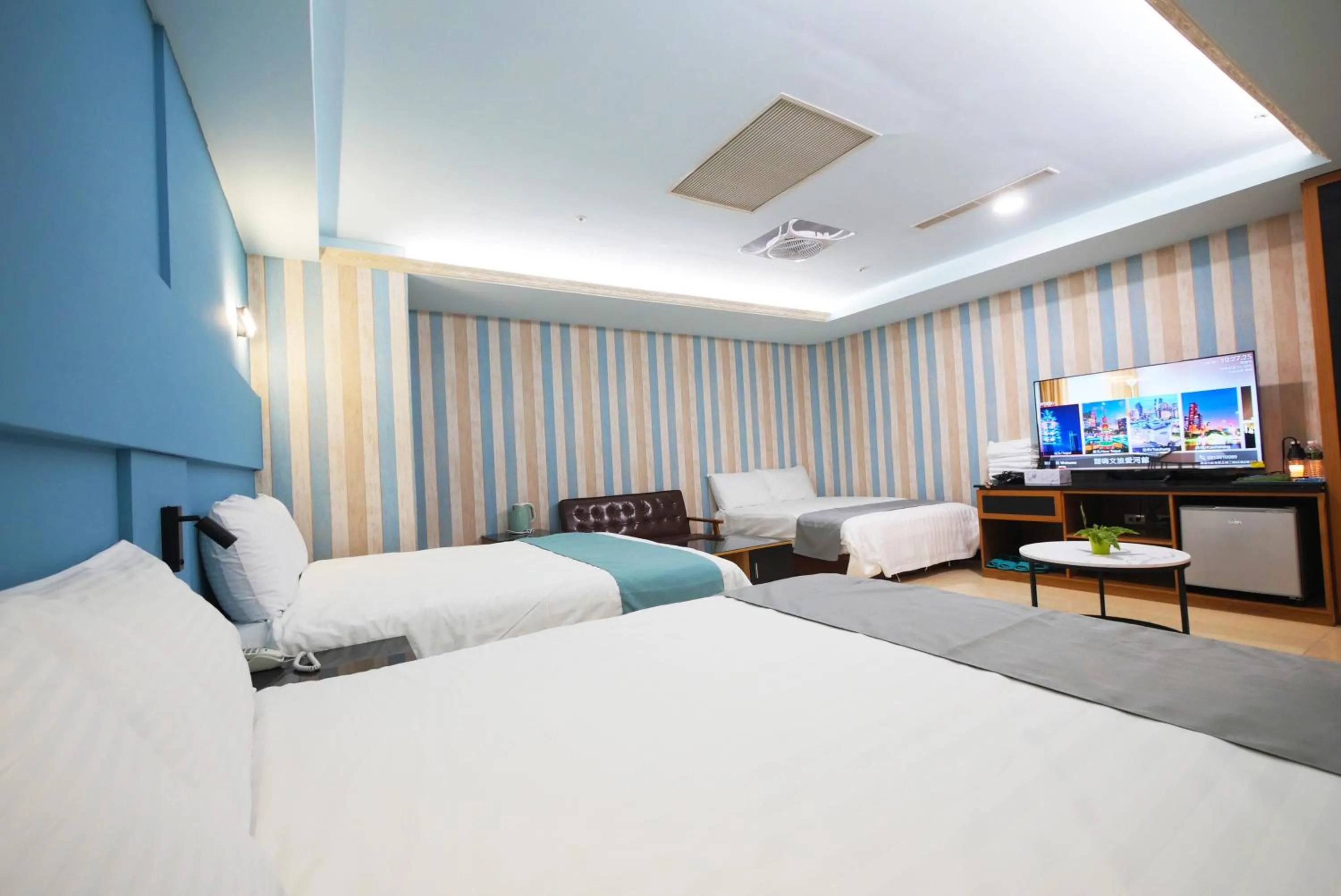 Bed in I Hi Loveriver Hotel