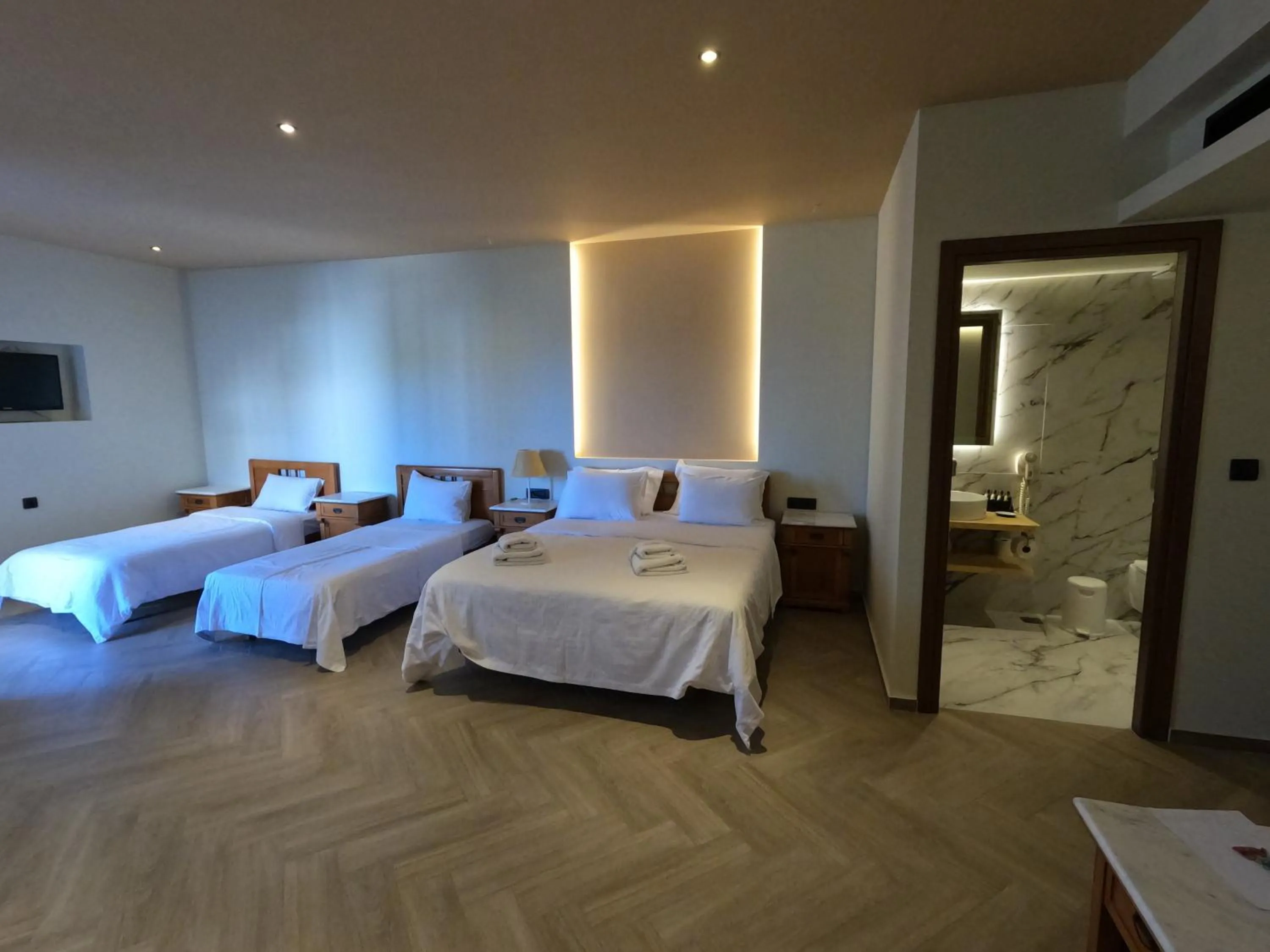 Bed in The Flower Of Monemvasia Hotel