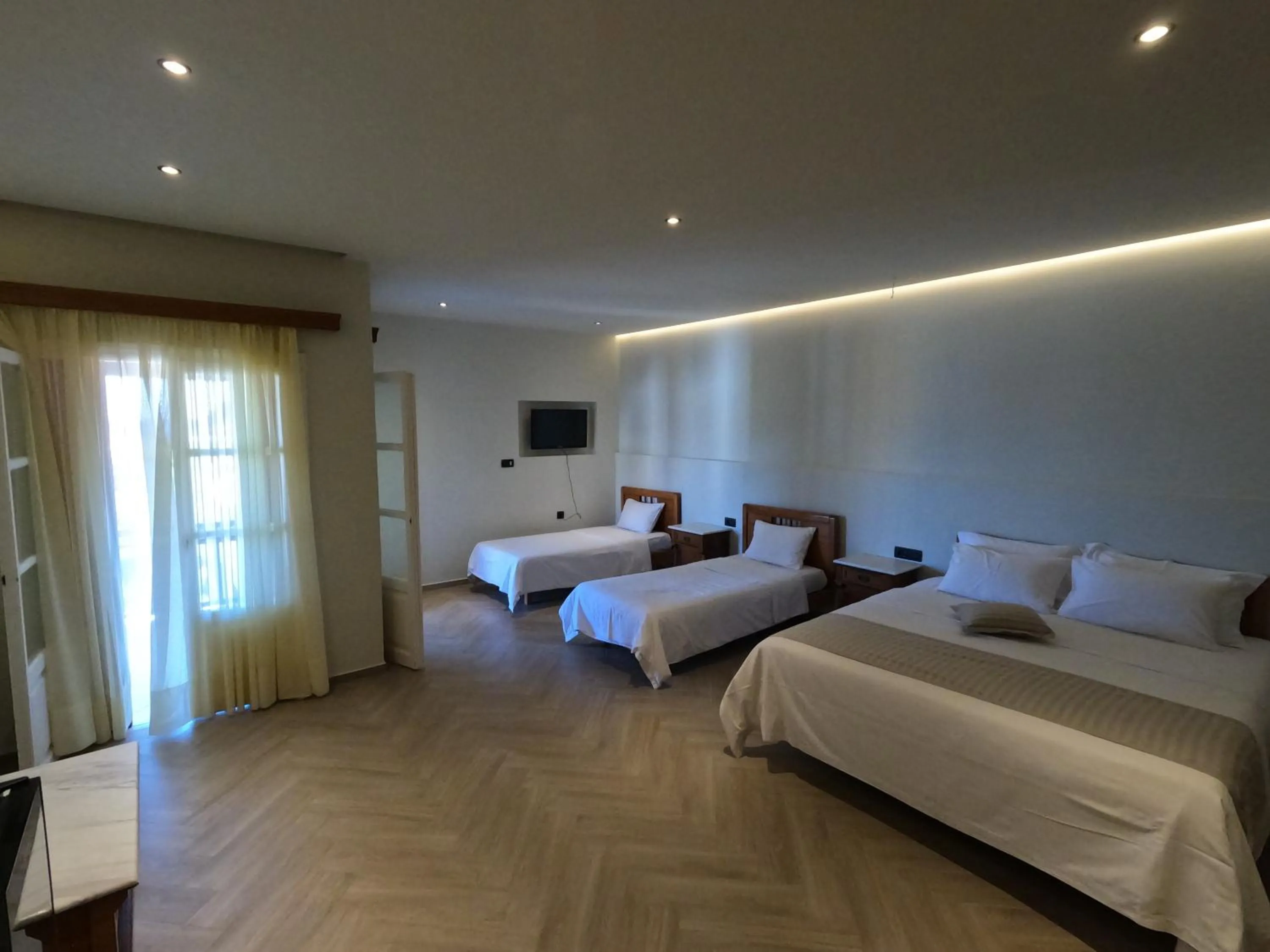 Bed in The Flower Of Monemvasia Hotel