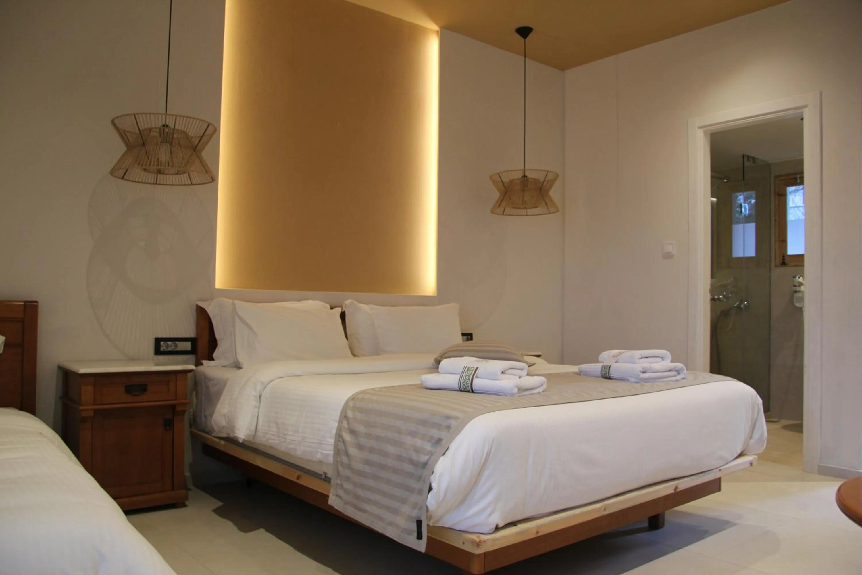 Bed in The Flower Of Monemvasia Hotel