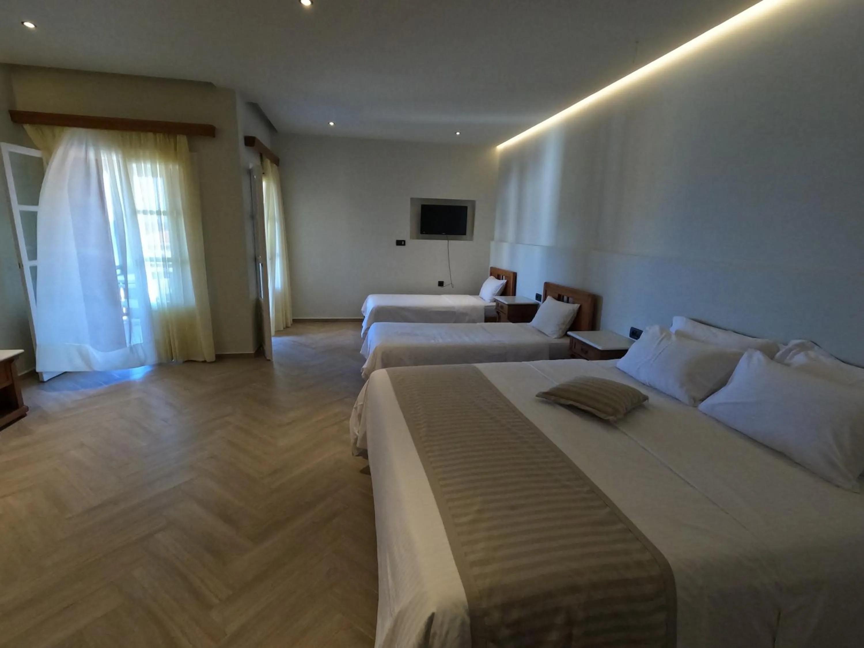 Bed in The Flower Of Monemvasia Hotel