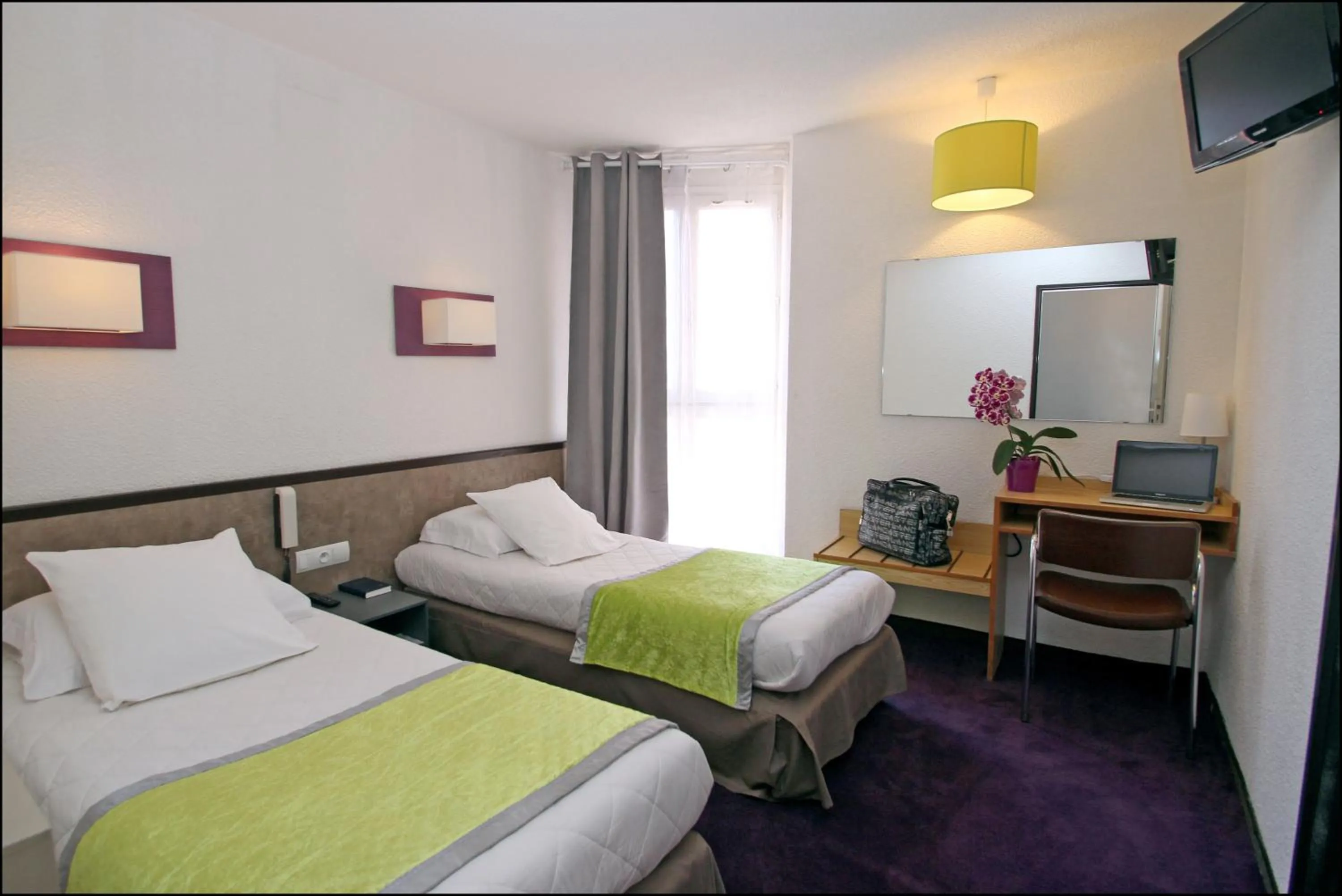 Photo of the whole room, Bed in Hôtel Peyramale