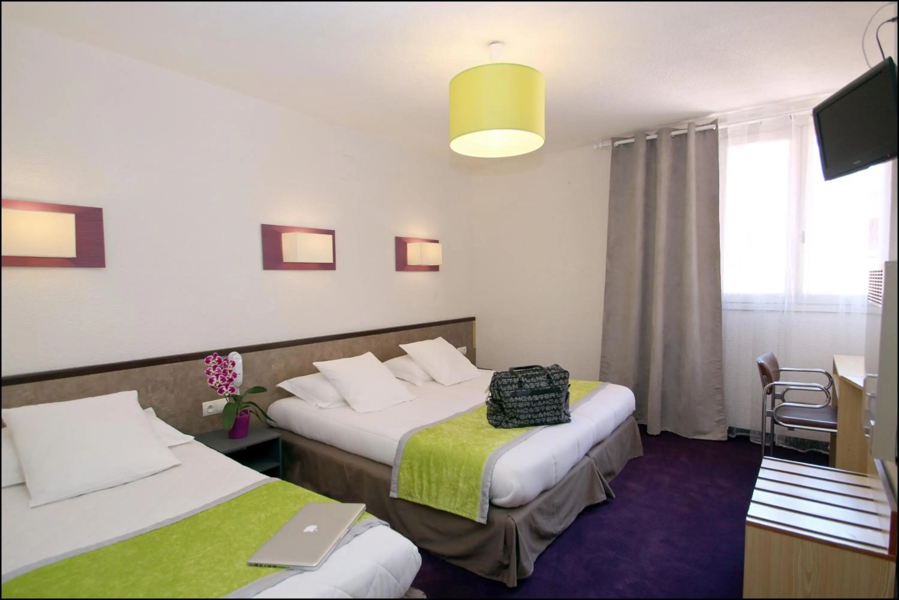 Photo of the whole room, Bed in Hôtel Peyramale