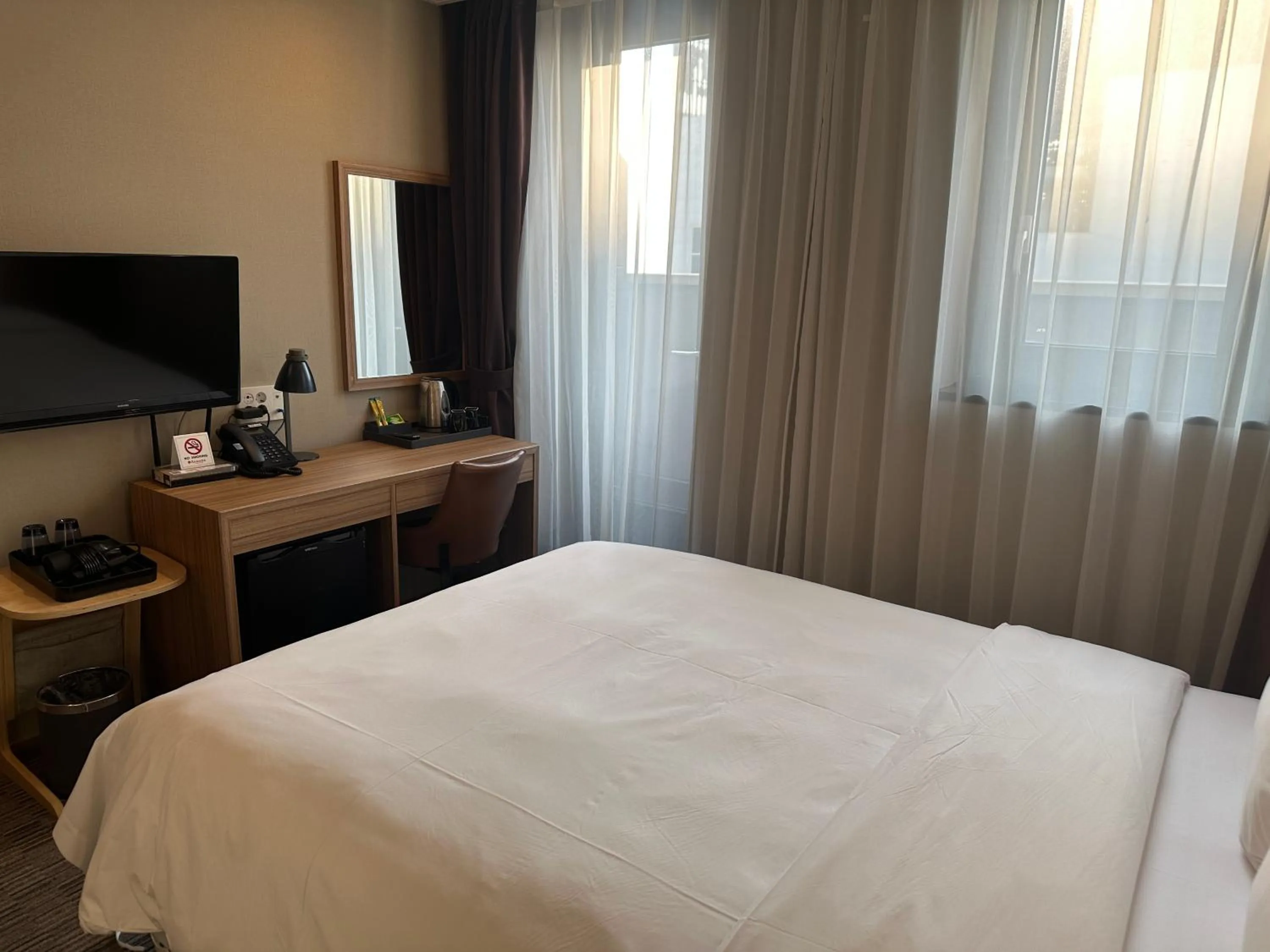 Bed in Golden Harbor Hotel Pyeongtaek
